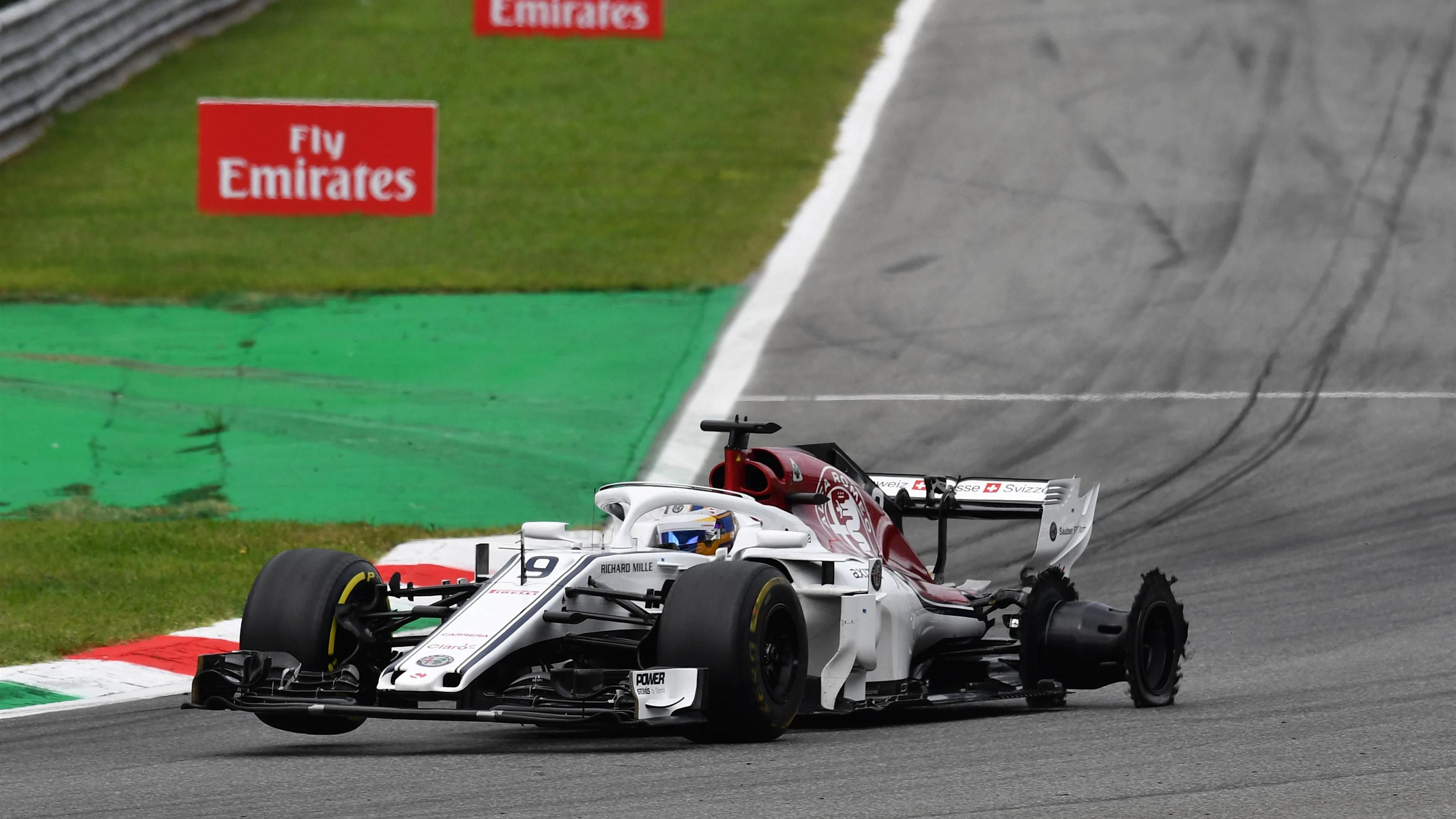 Marcus Ericsson, Alfa Romeo Sauber C37 with rear puncture and damage on lap one at Formula One