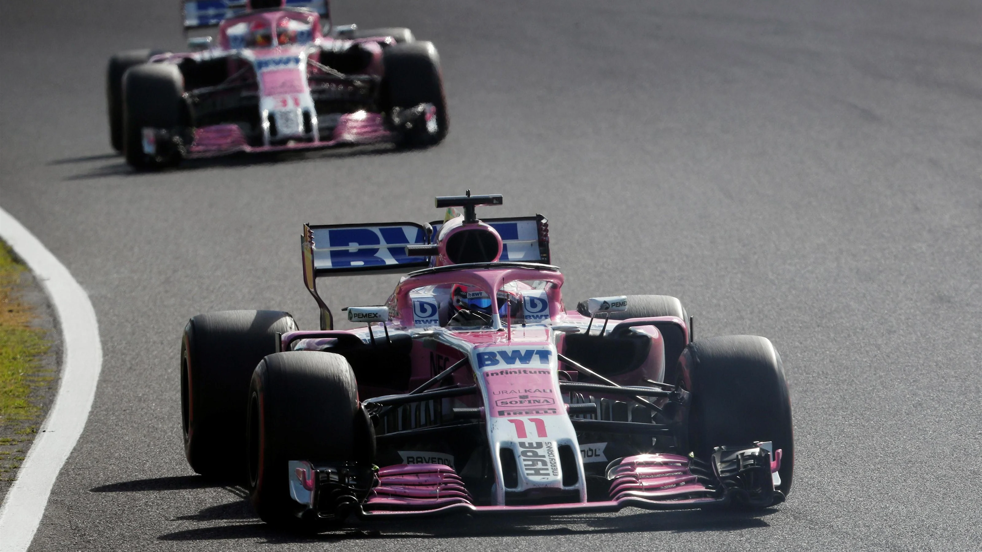 Sergio Perez, Racing Point Force India VJM11 leads Esteban Ocon, Racing Point Force India VJM11 at