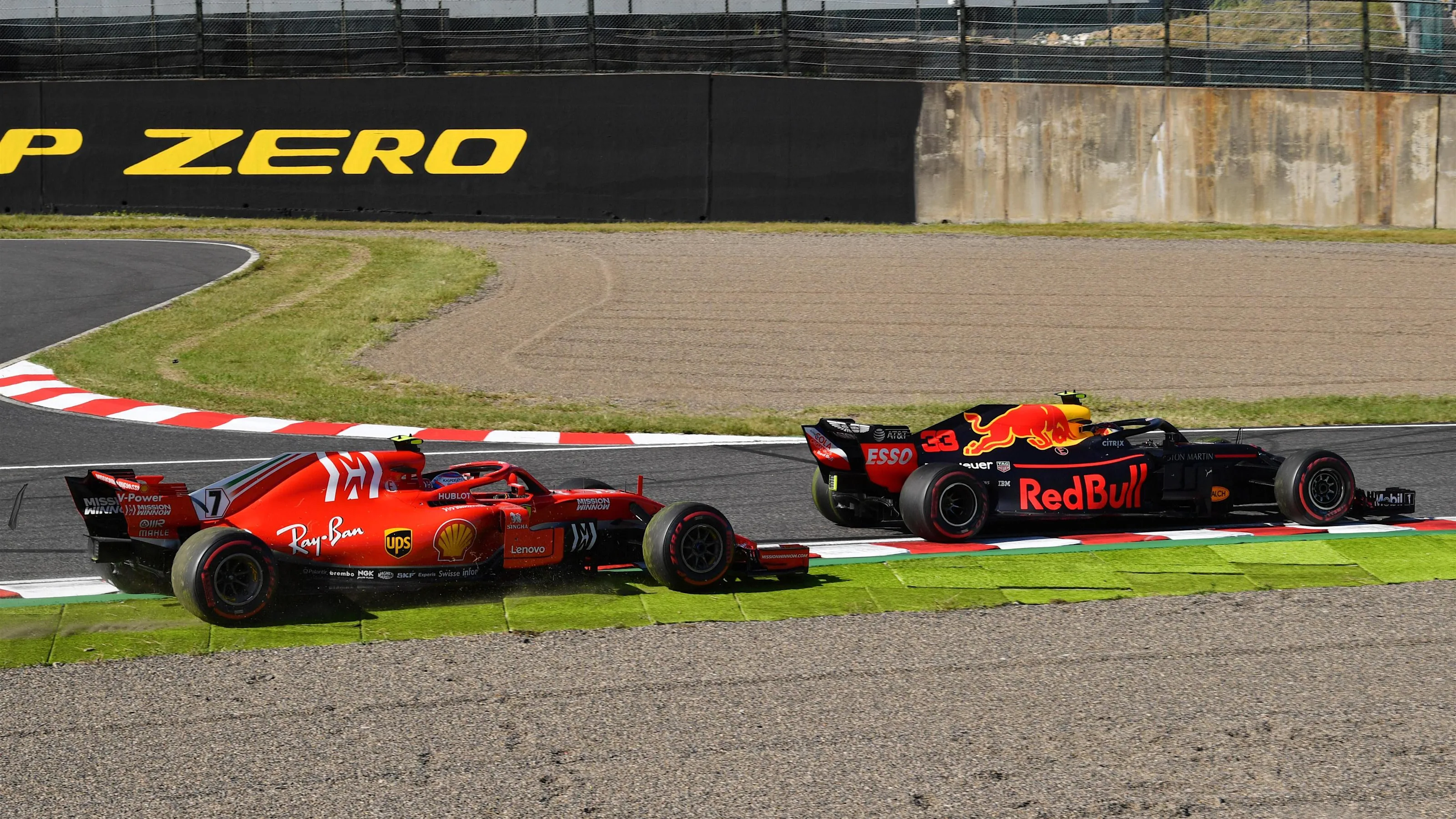 Kimi Raikkonen, Ferrari SF71H and Max Verstappen, Red Bull Racing RB14 battle at Formula One World