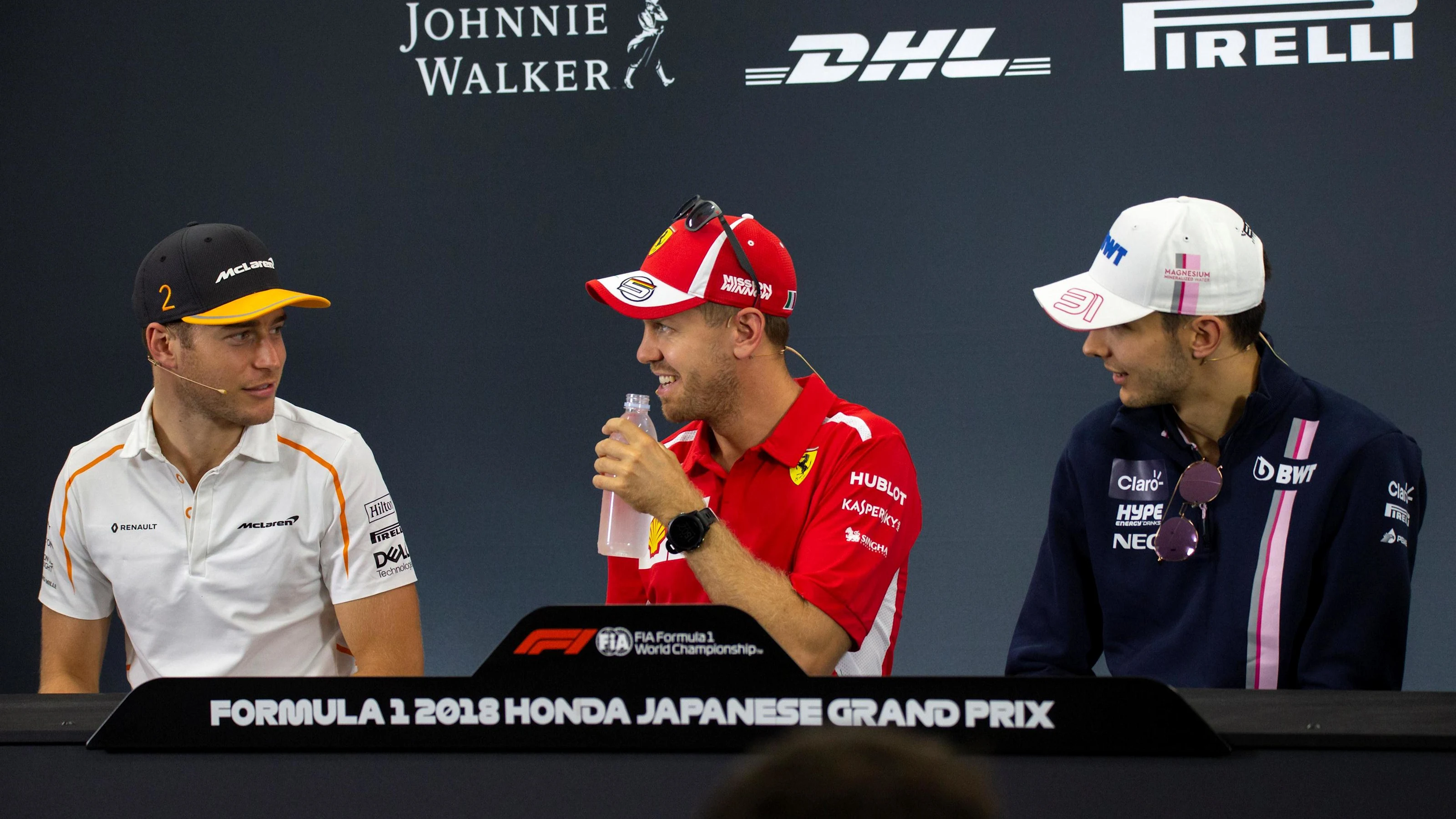 (L to R): Stoffel Vandoorne, McLaren, Sebastian Vettel, Ferrari and Esteban Ocon, Racing Point
