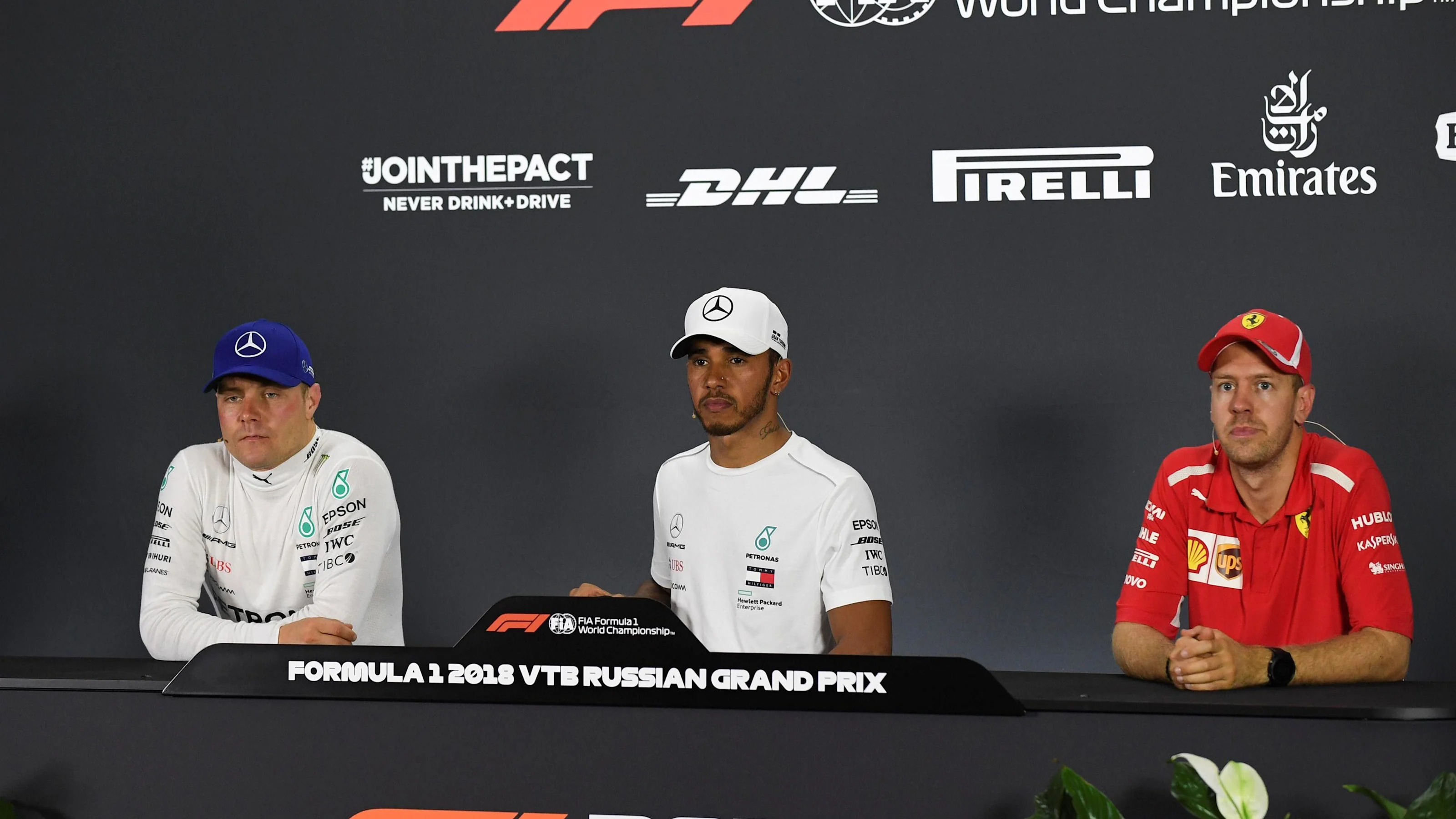 (L to R): Valtteri Bottas, Mercedes AMG F1, Lewis Hamilton, Mercedes AMG F1 and Sebastian Vettel,