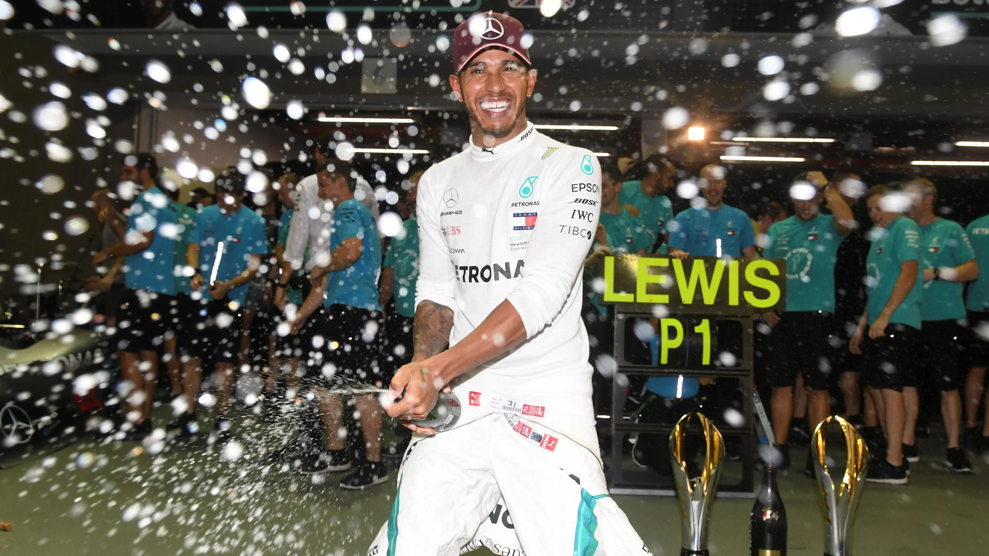Lewis Hamilton, Mercedes AMG F1 celebrates with the champagne and his team at Formula One World