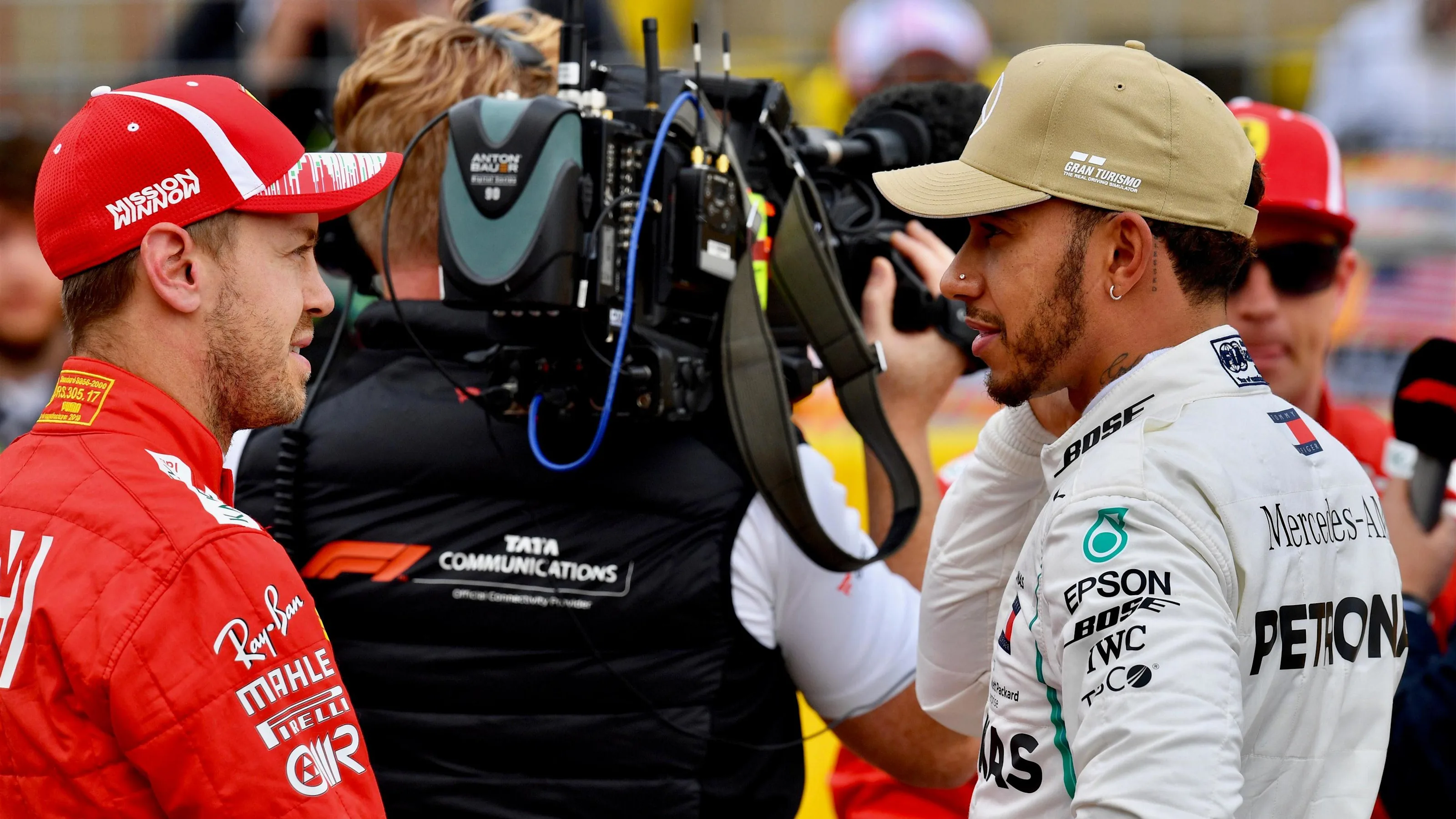 Sebastian Vettel, Ferrari and Lewis Hamilton, Mercedes AMG F1 in parc ferme at Formula World
