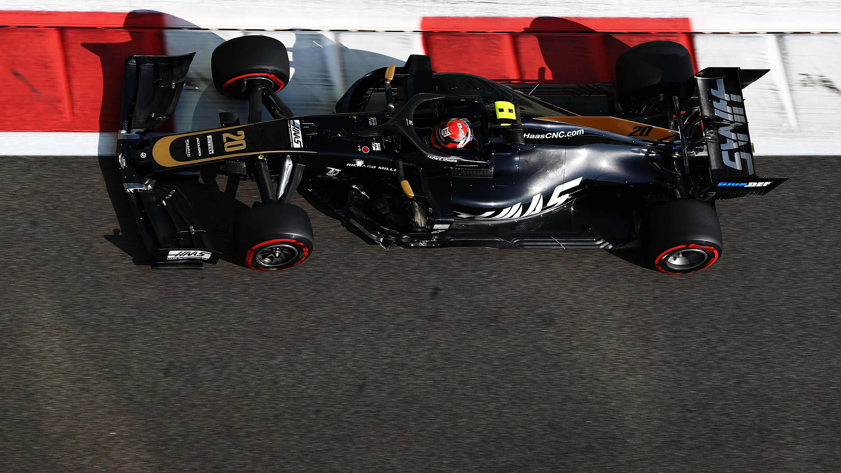 ABU DHABI, UNITED ARAB EMIRATES - NOVEMBER 29: Kevin Magnussen of Denmark driving the (20) Haas F1