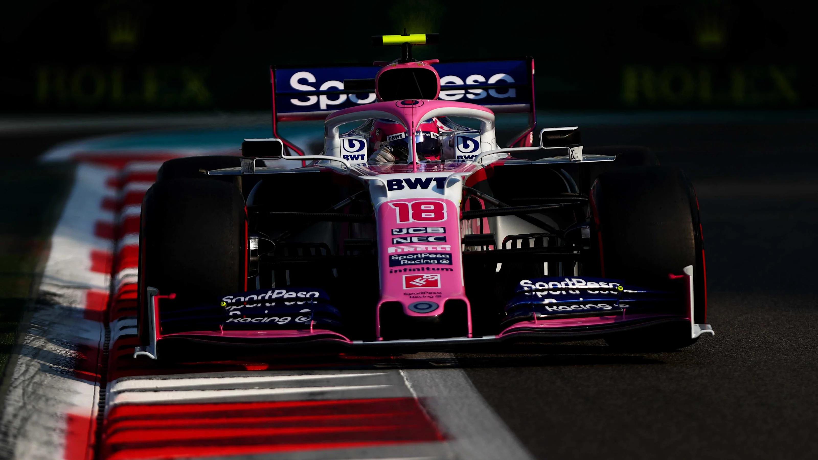 ABU DHABI, UNITED ARAB EMIRATES - NOVEMBER 30: Lance Stroll of Canada driving the (18) Racing Point