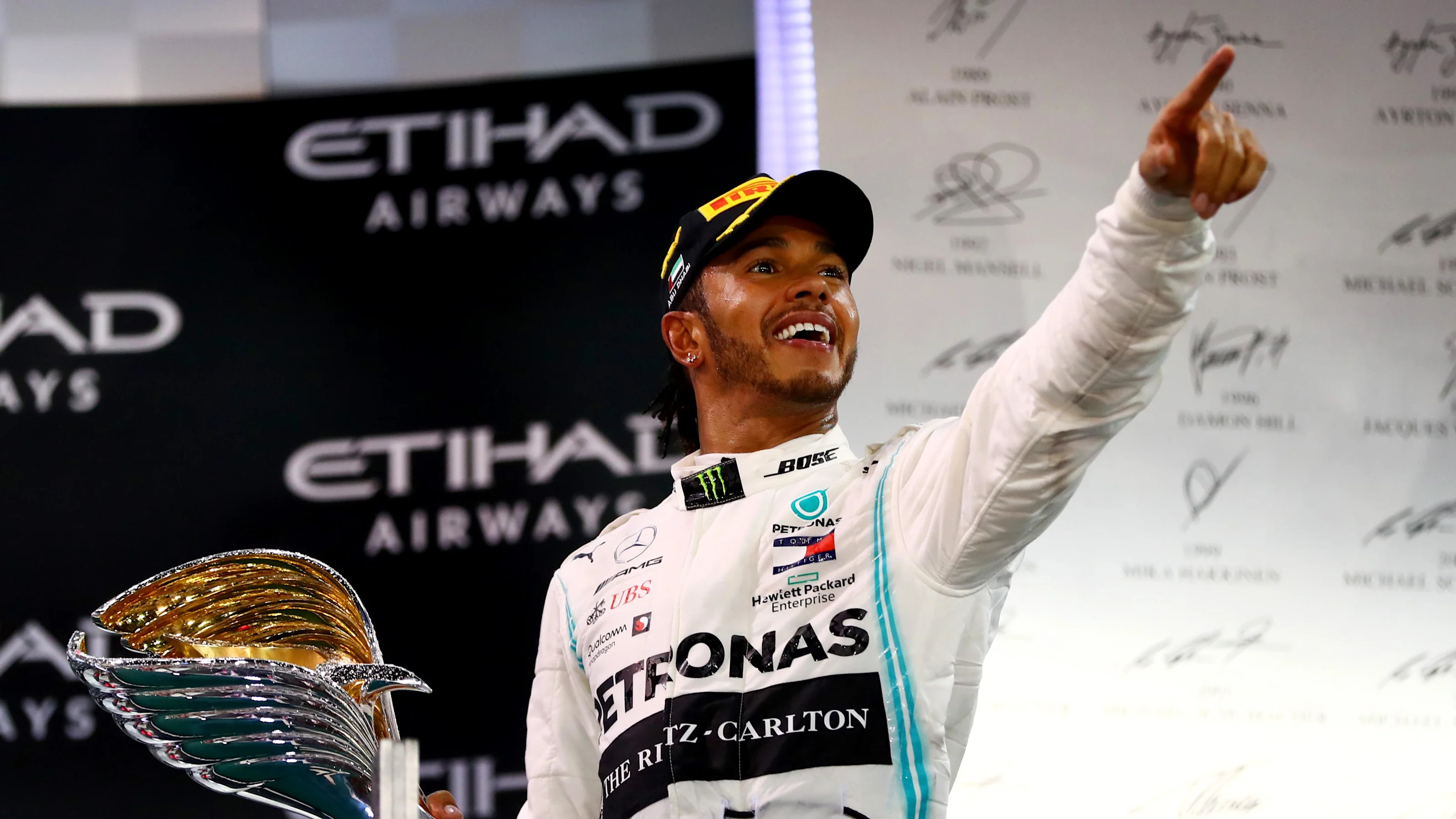 ABU DHABI, UNITED ARAB EMIRATES - DECEMBER 01: Race winner Lewis Hamilton of Great Britain and