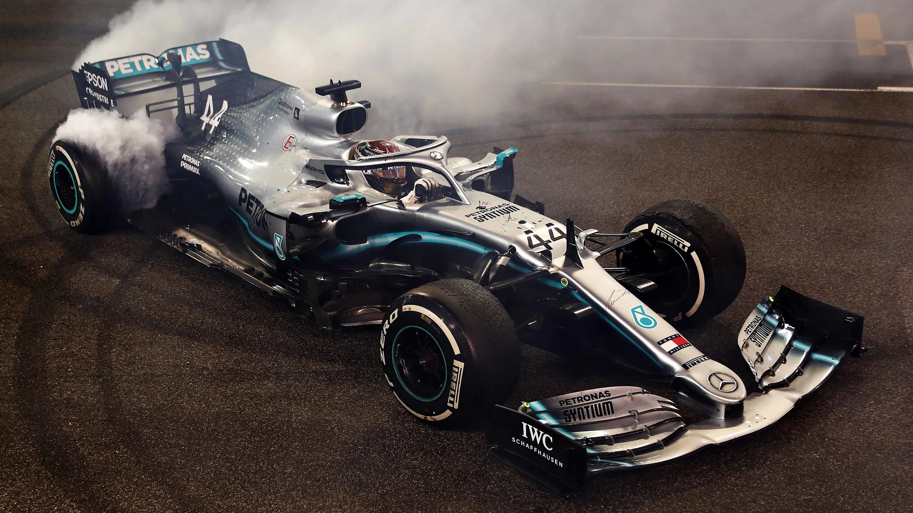 ABU DHABI, UNITED ARAB EMIRATES - DECEMBER 01: Race winner Lewis Hamilton of Great Britain and