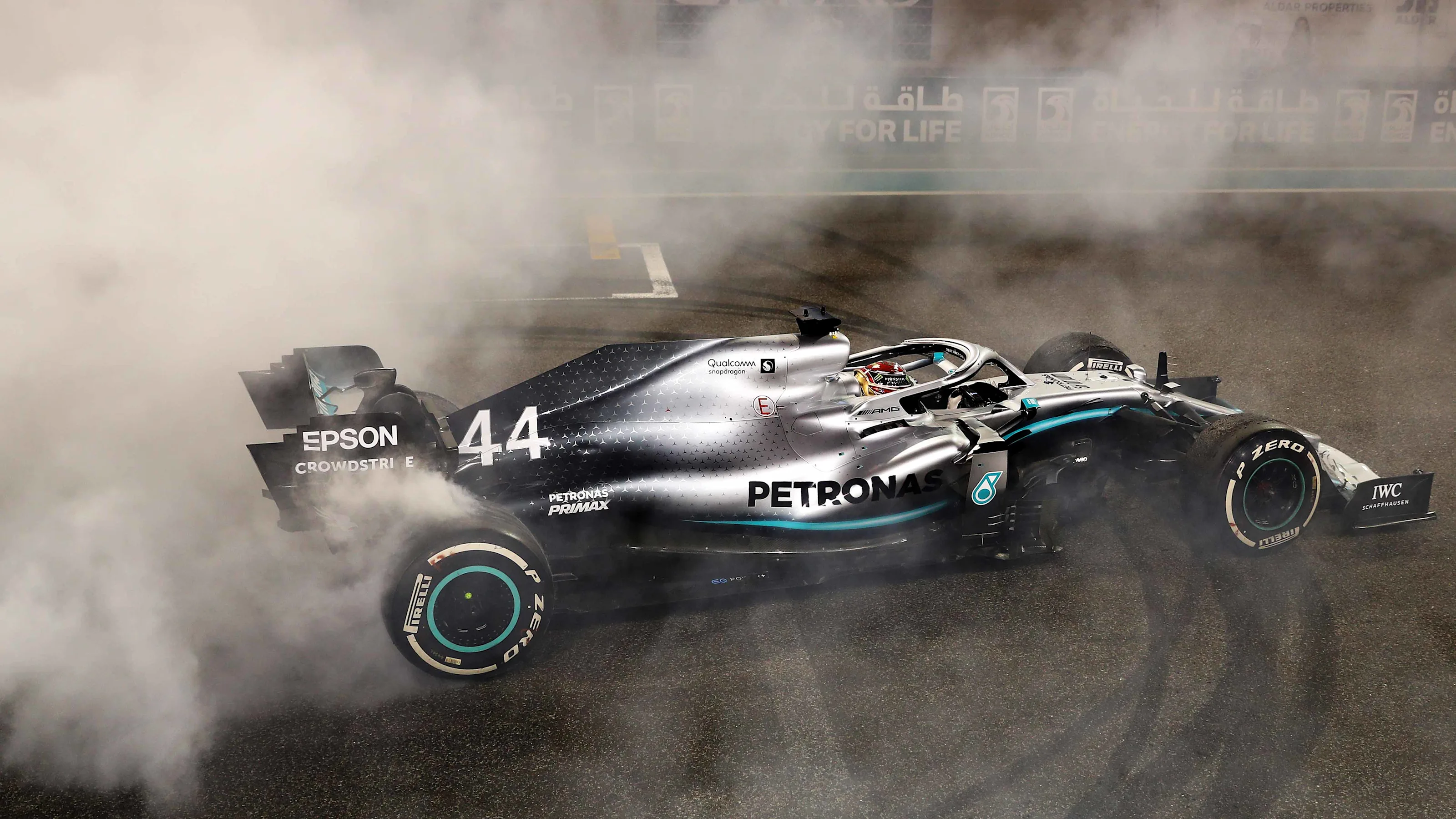 ABU DHABI, UNITED ARAB EMIRATES - DECEMBER 01: Race winner Lewis Hamilton of Great Britain and