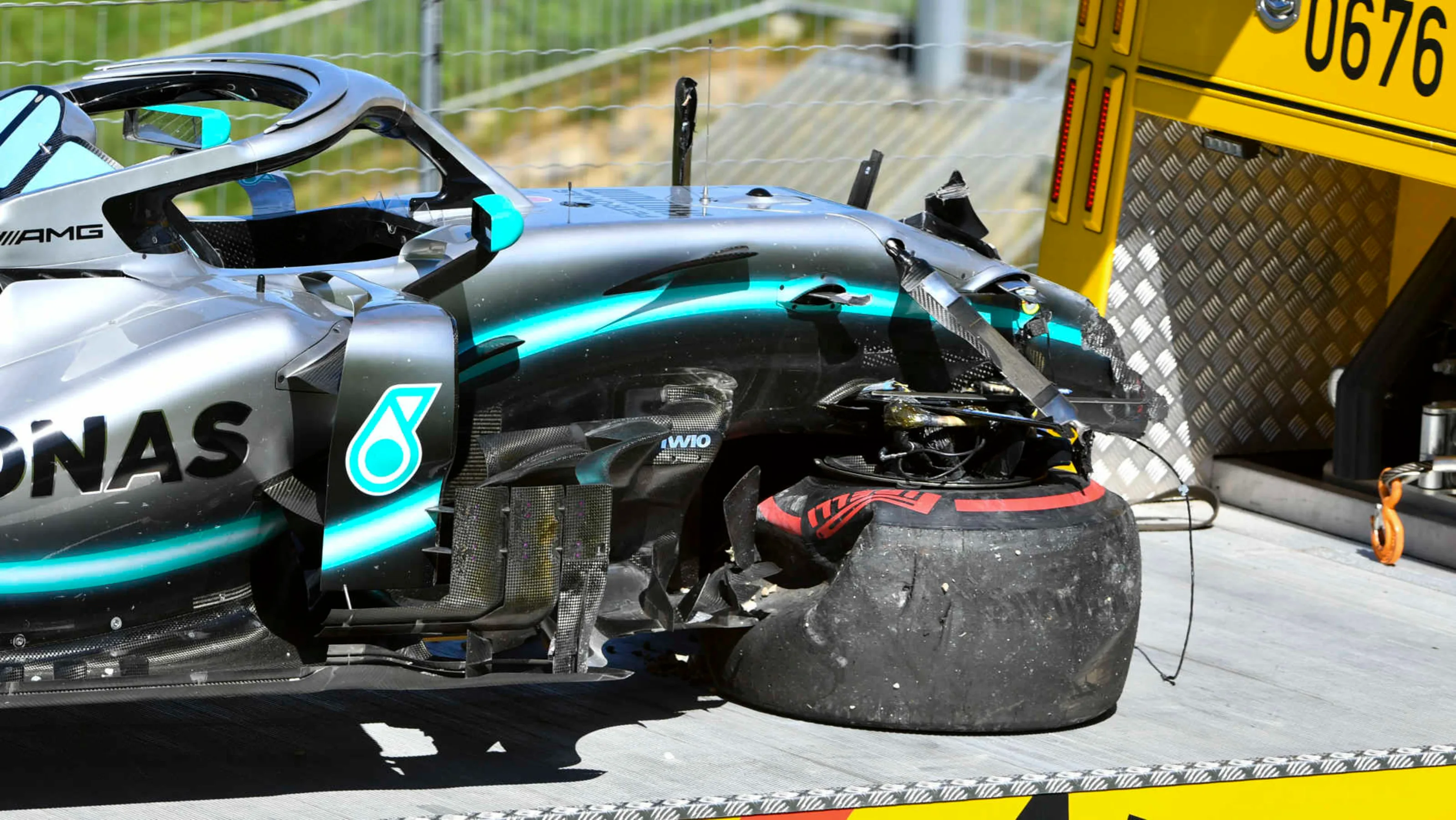 RED BULL RING, AUSTRIA - JUNE 28: The damaged car of Valtteri Bottas, Mercedes AMG W10, on a flat