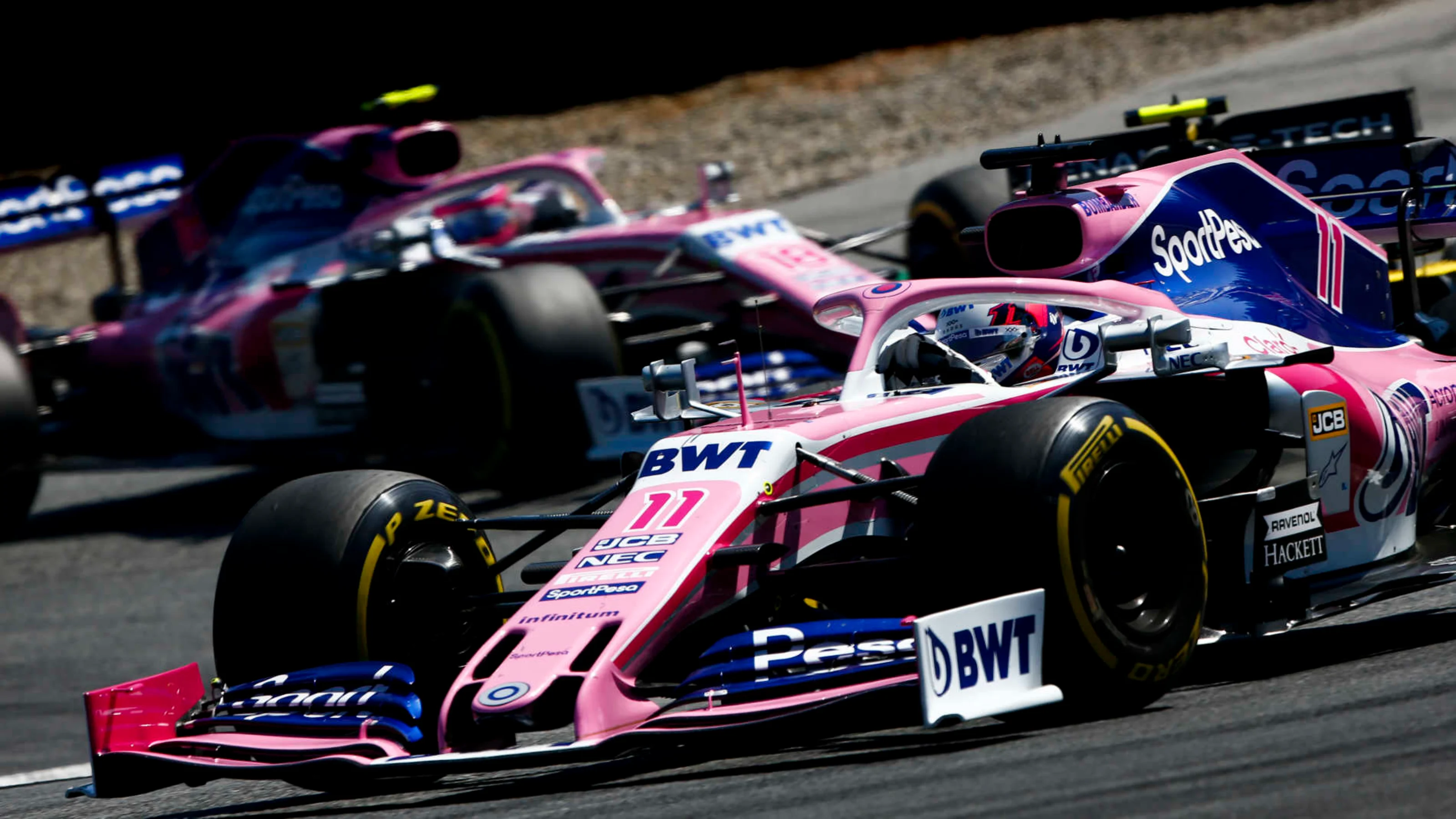 RED BULL RING, AUSTRIA - JUNE 30: Sergio Perez, Racing Point RP19, leads Nico Hulkenberg, Renault