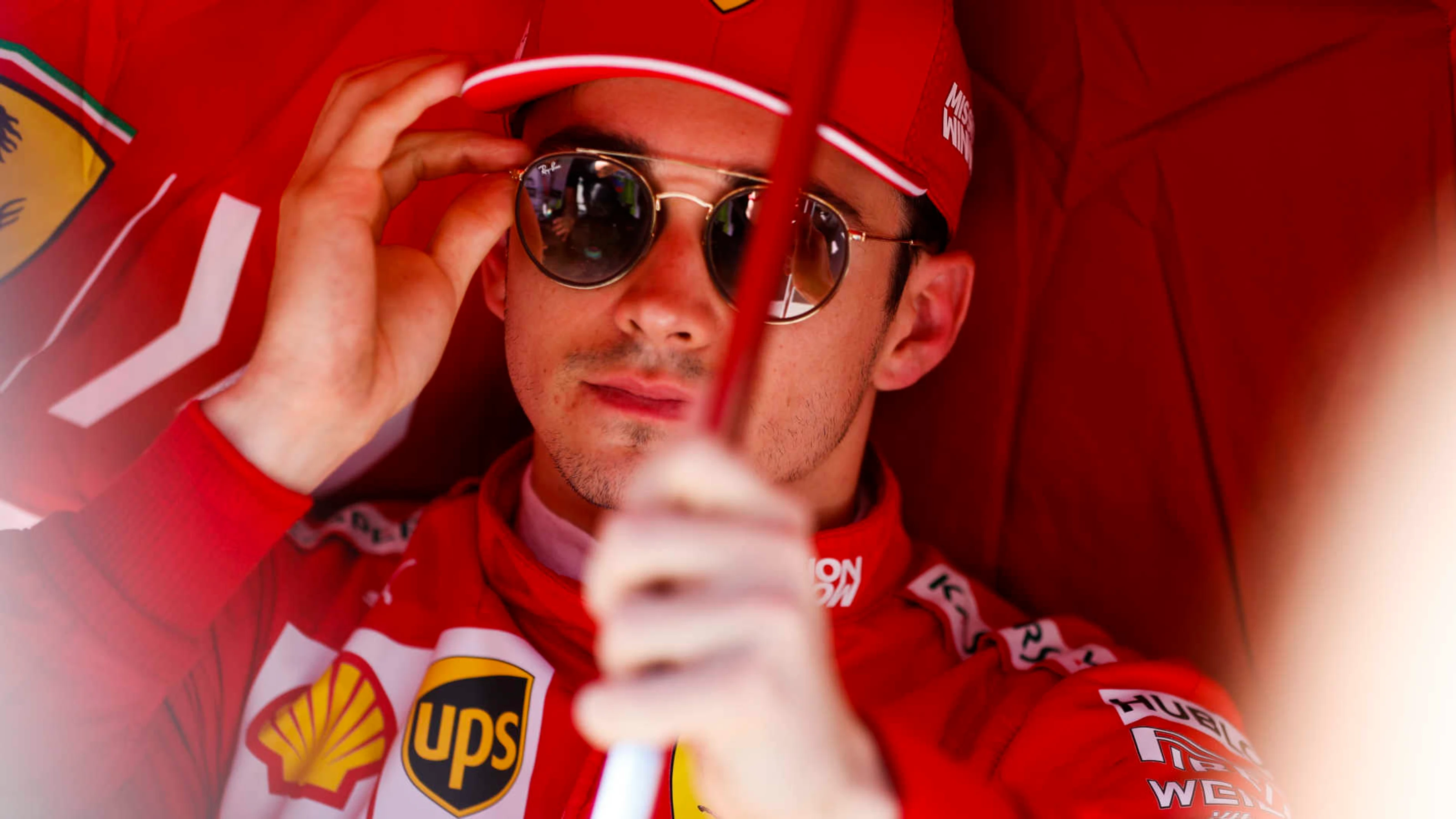 BAKU CITY CIRCUIT, AZERBAIJAN - APRIL 28: Charles Leclerc, Ferrari SF90, sits under an umbrella on