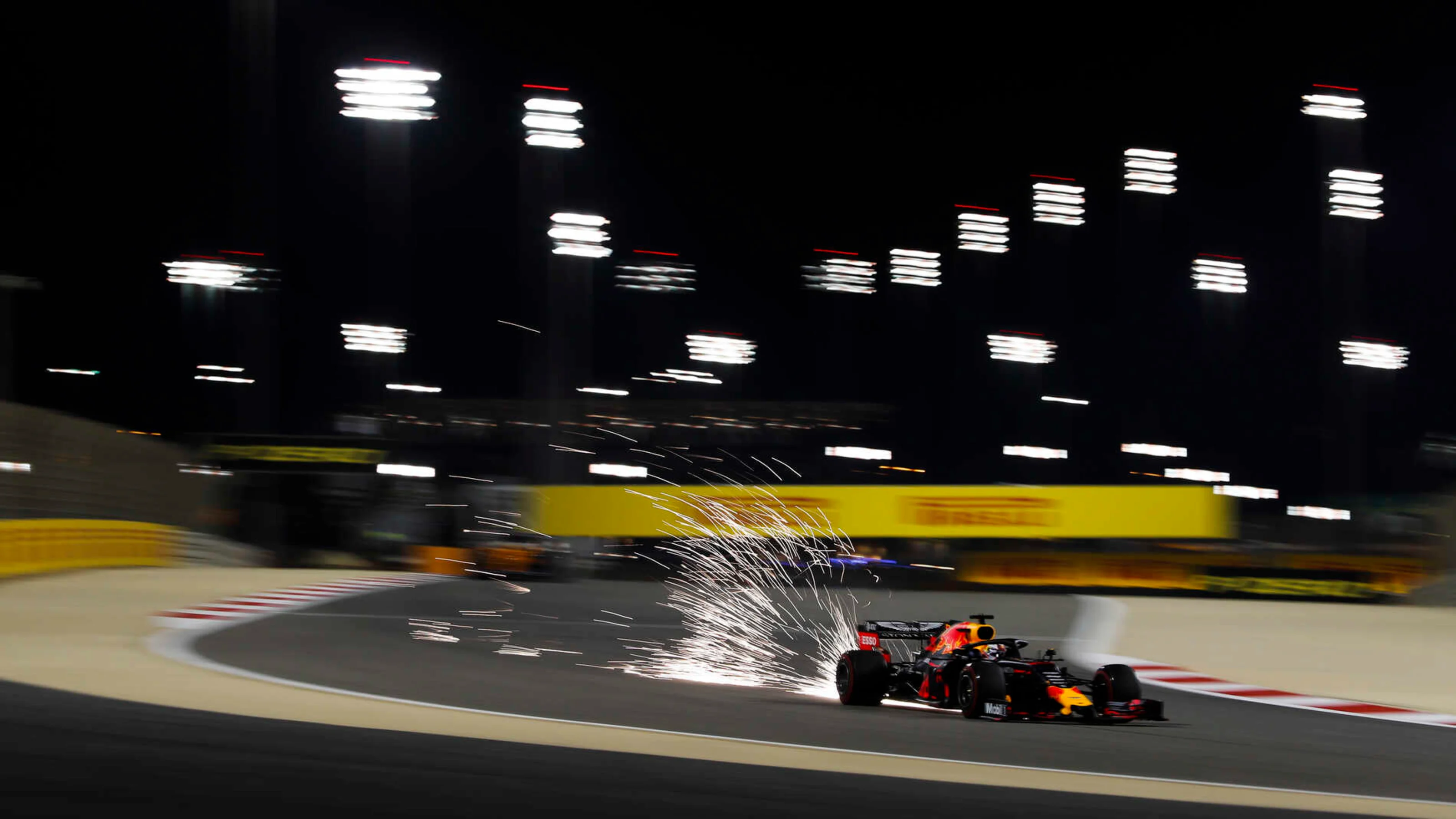 BAHRAIN INTERNATIONAL CIRCUIT, BAHRAIN - MARCH 29: Sparks fly from the car of Max Verstappen, Red