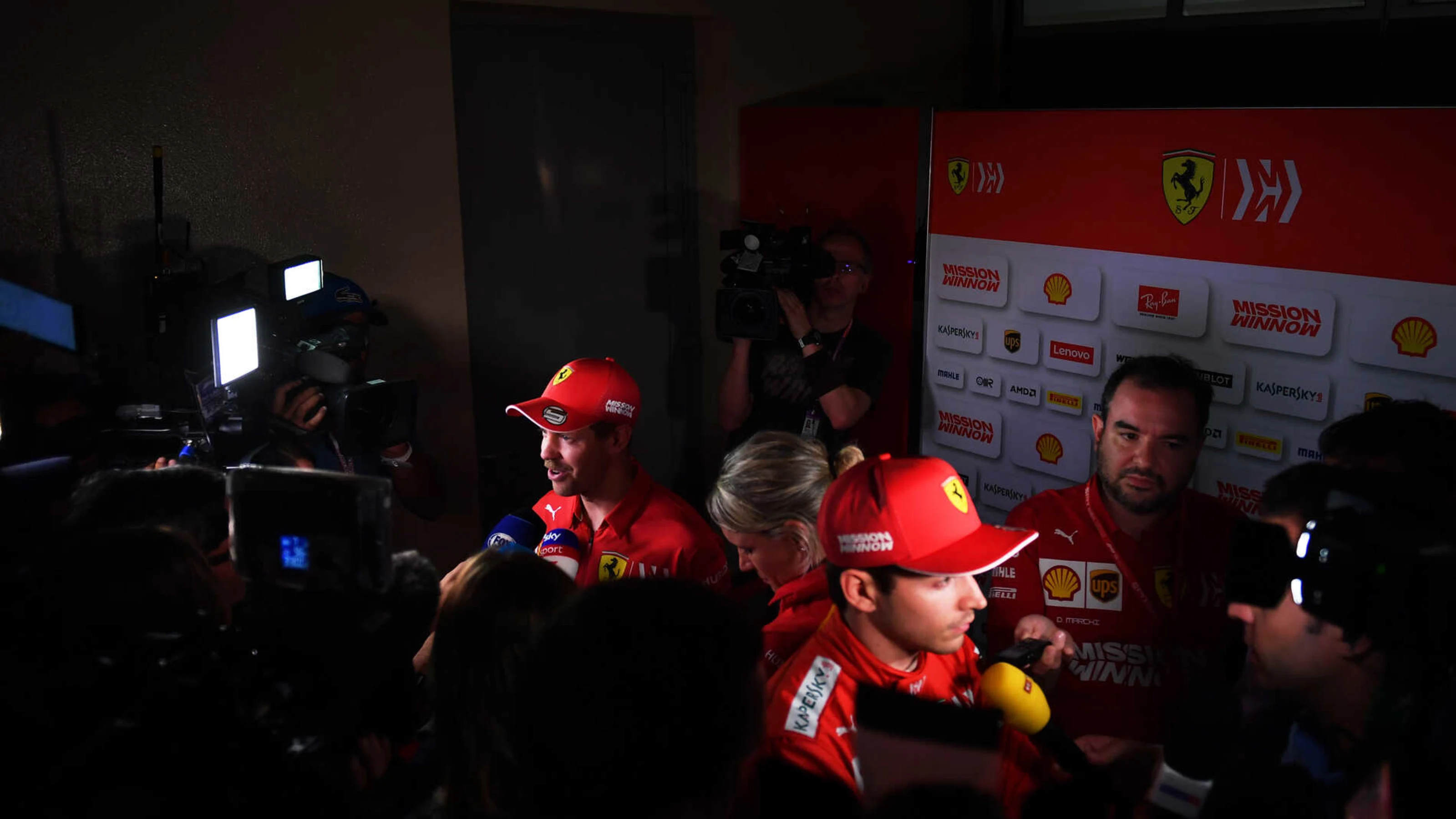 BAHRAIN INTERNATIONAL CIRCUIT, BAHRAIN - MARCH 29: Sebastian Vettel, Ferrari, and Charles Leclerc,