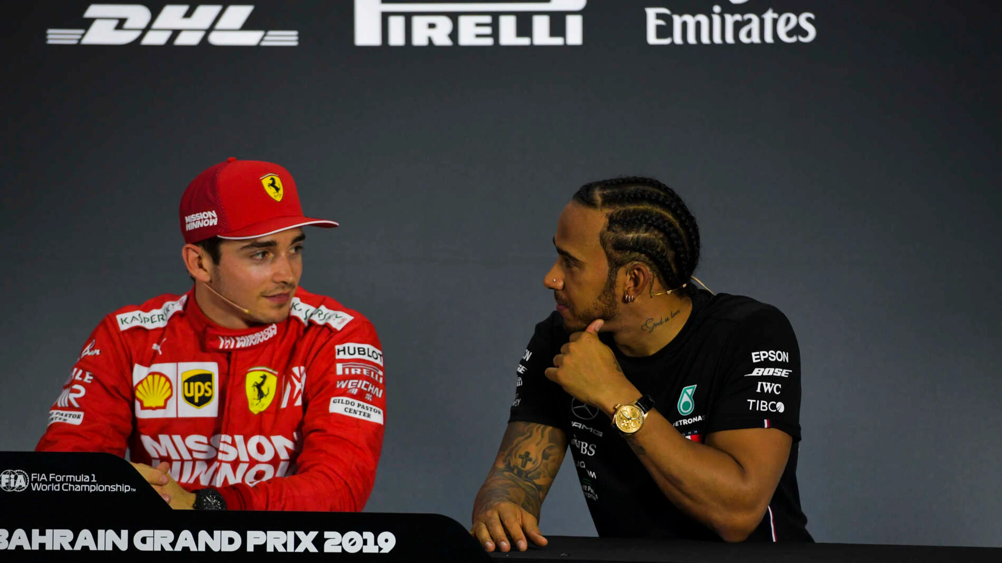 BAHRAIN INTERNATIONAL CIRCUIT, BAHRAIN - MARCH 30: Charles Leclerc, Ferrari, and Lewis Hamilton,