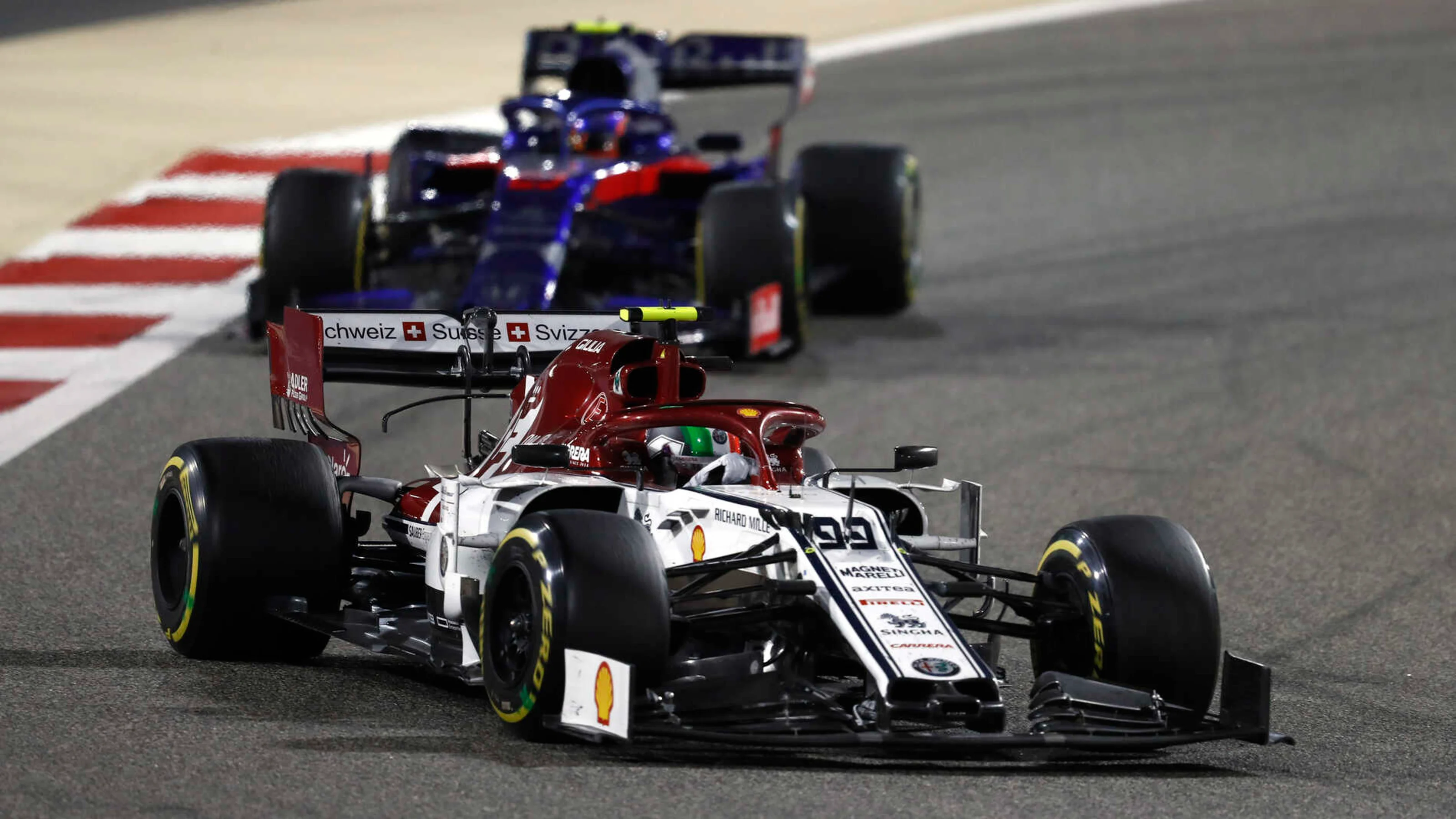 BAHRAIN INTERNATIONAL CIRCUIT, BAHRAIN - MARCH 31: Antonio Giovinazzi, Alfa Romeo Racing C38, leads