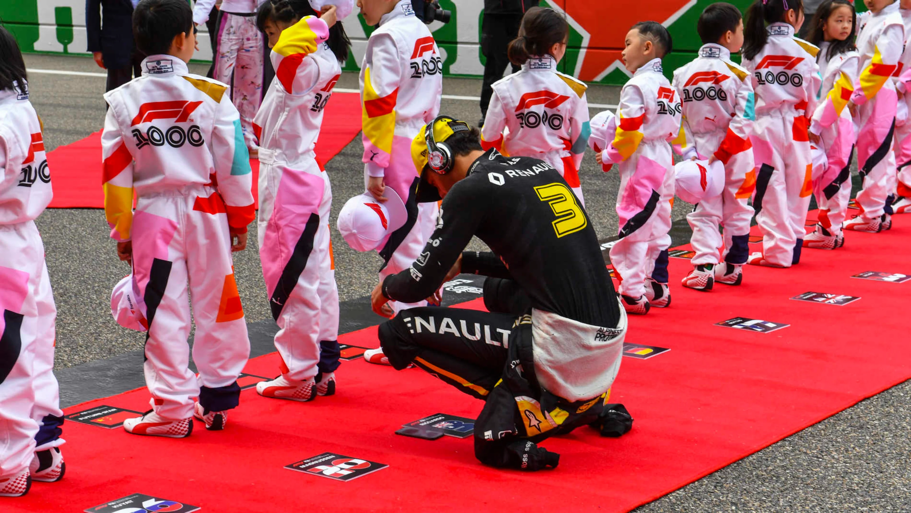 SHANGHAI INTERNATIONAL CIRCUIT, CHINA - APRIL 14: Daniel Ricciardo, Renault, on the grid with the