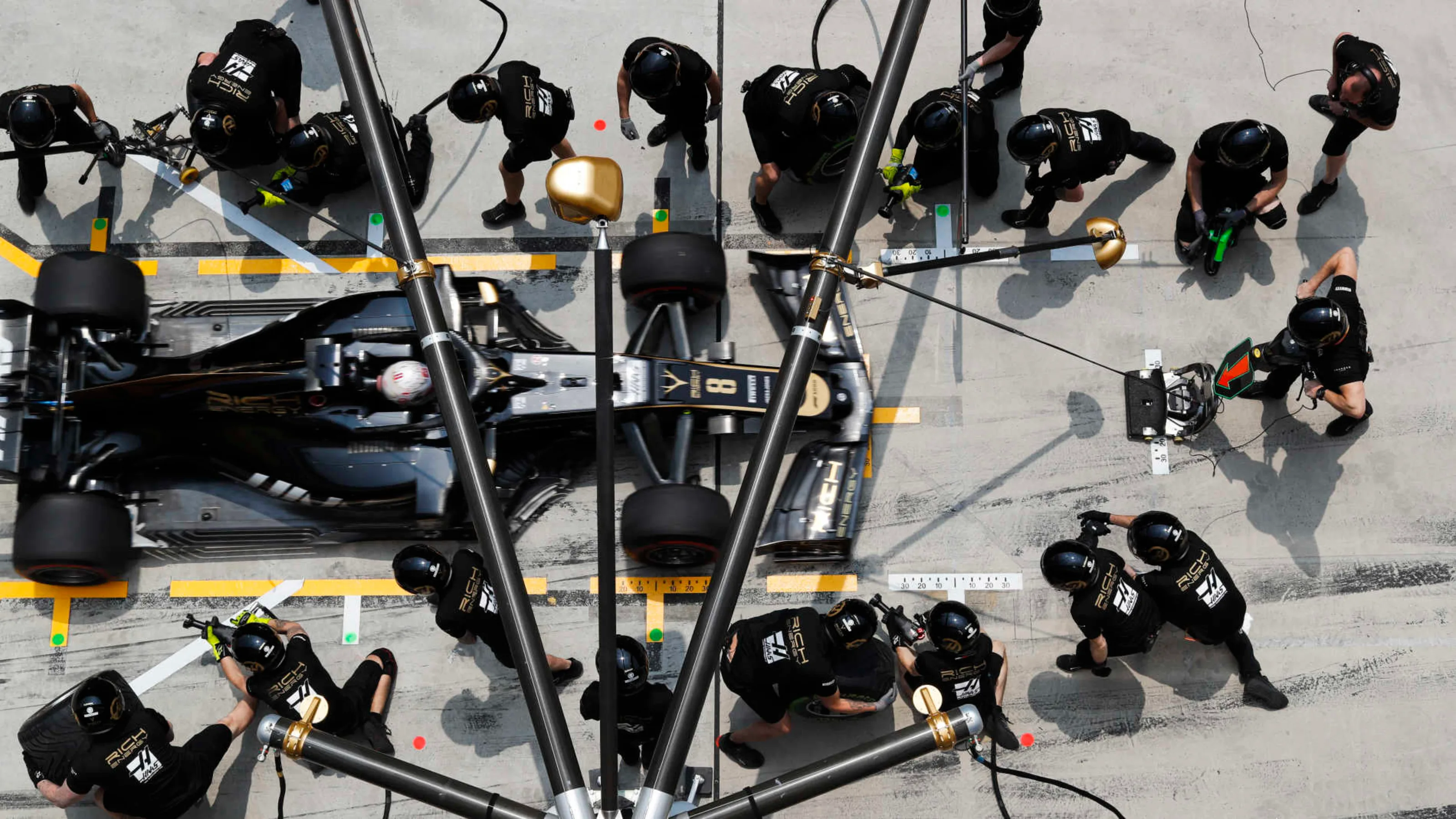SHANGHAI INTERNATIONAL CIRCUIT, CHINA - APRIL 12: Romain Grosjean, Haas VF-19, makes a stop during