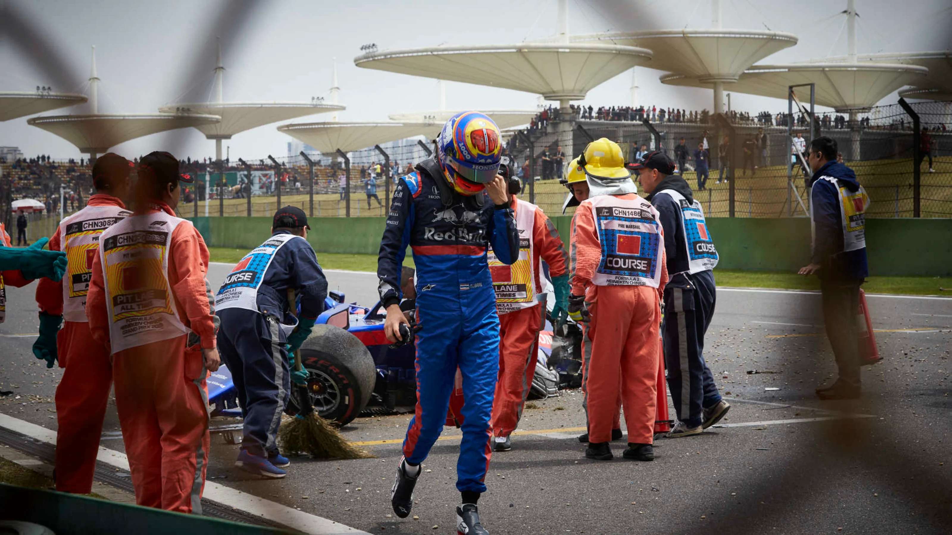 SHANGHAI INTERNATIONAL CIRCUIT, CHINA - APRIL 13: Alexander Albon, Toro Rosso, walks away from his