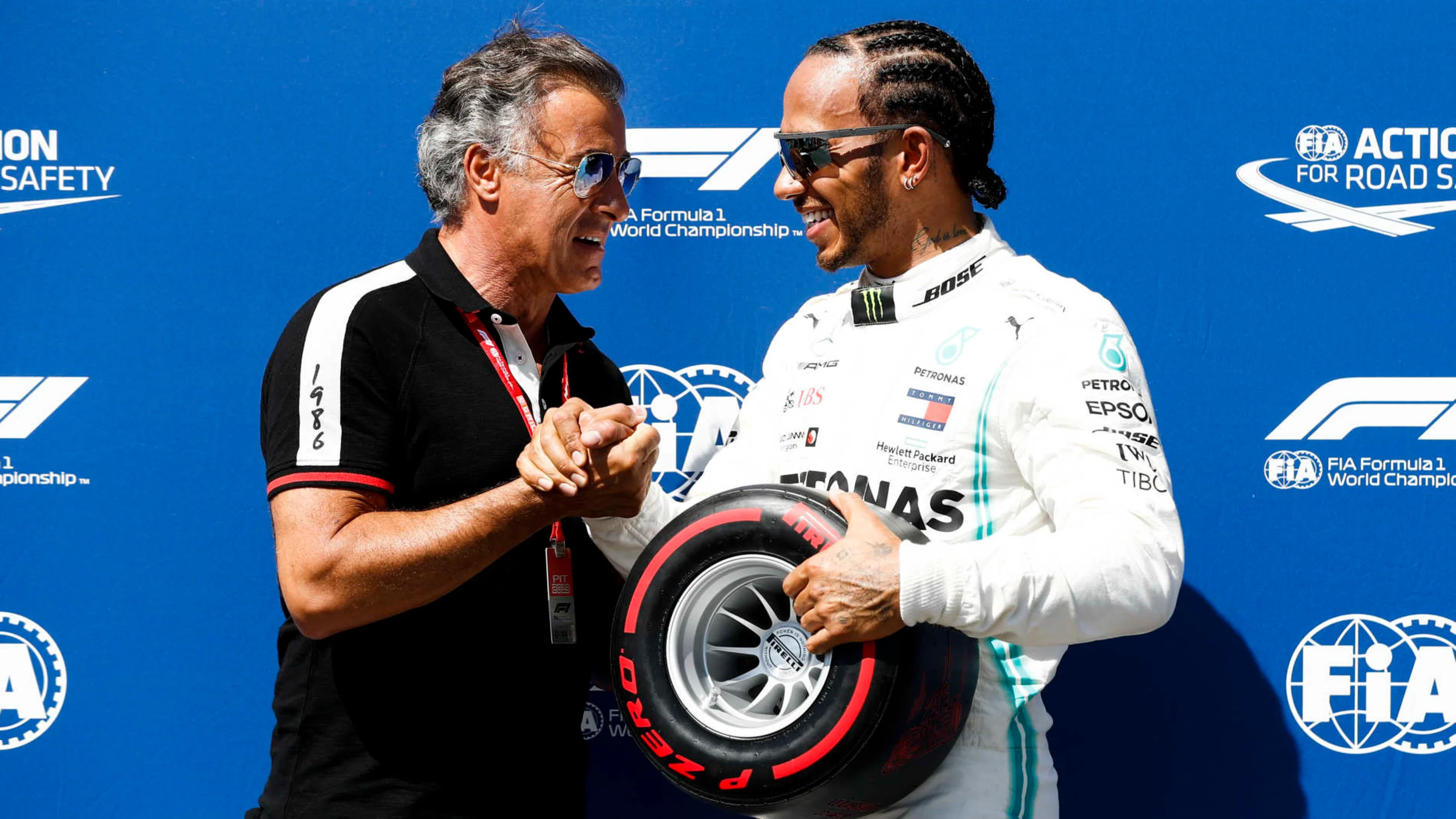 CIRCUIT PAUL RICARD, FRANCE - JUNE 22: Jean Alesi presents Lewis Hamilton, Mercedes AMG F1, with