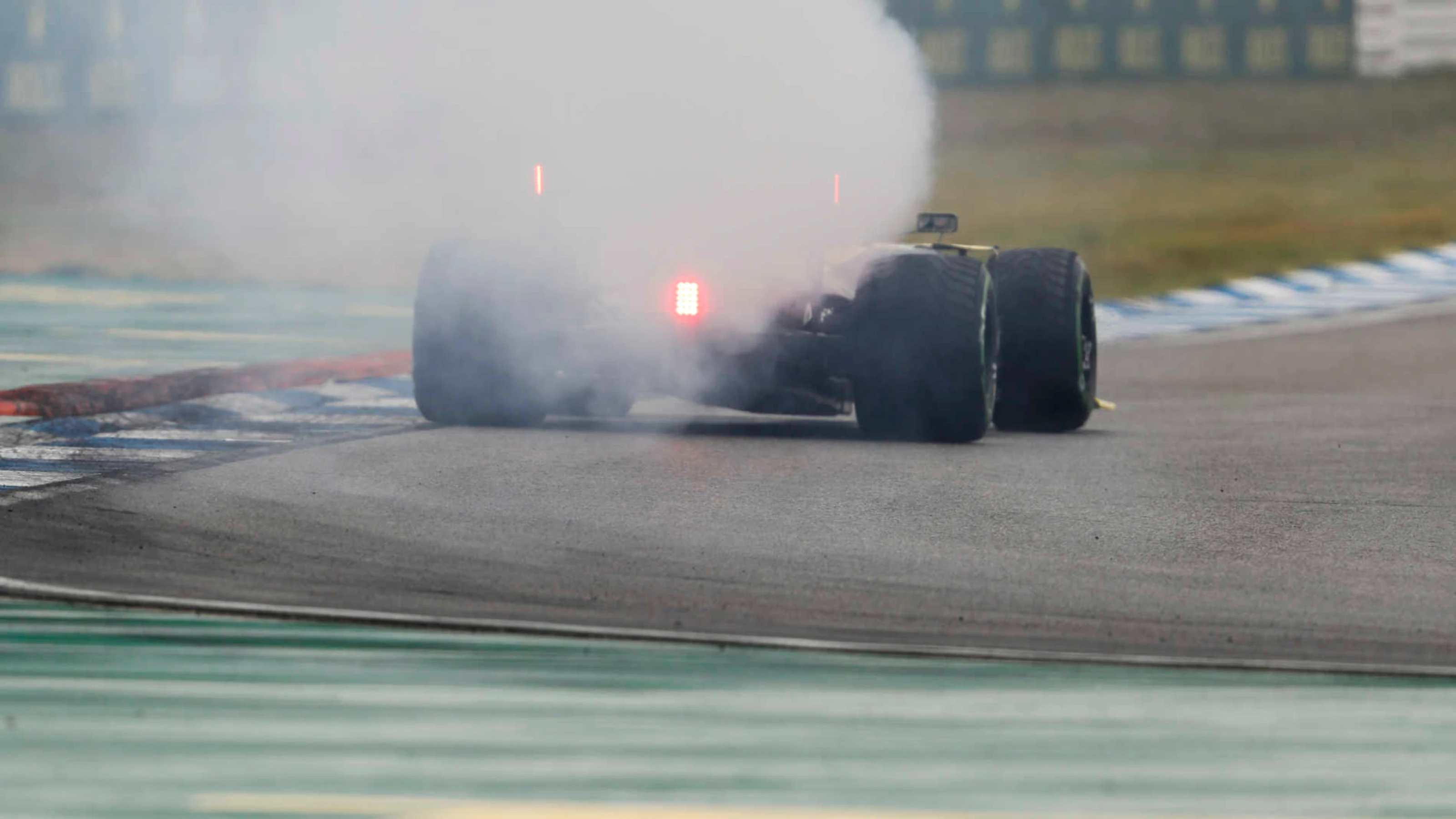 HOCKENHEIMRING, GERMANY - JULY 28: Smoke coming out the back of Daniel Ricciardo, Renault R.S.19