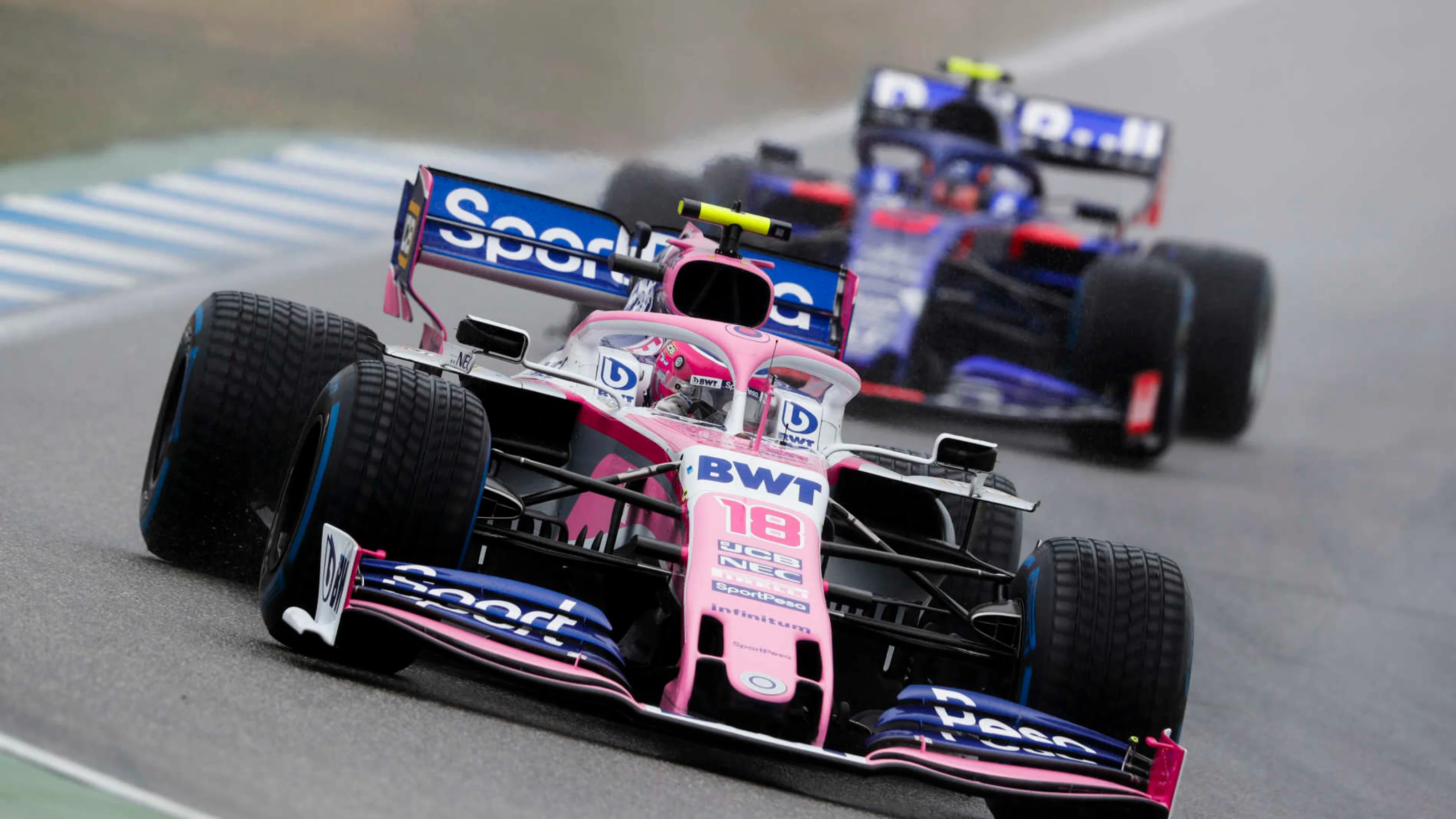 HOCKENHEIMRING, GERMANY - JULY 28: Lance Stroll, Racing Point RP19, leads Alexander Albon, Toro
