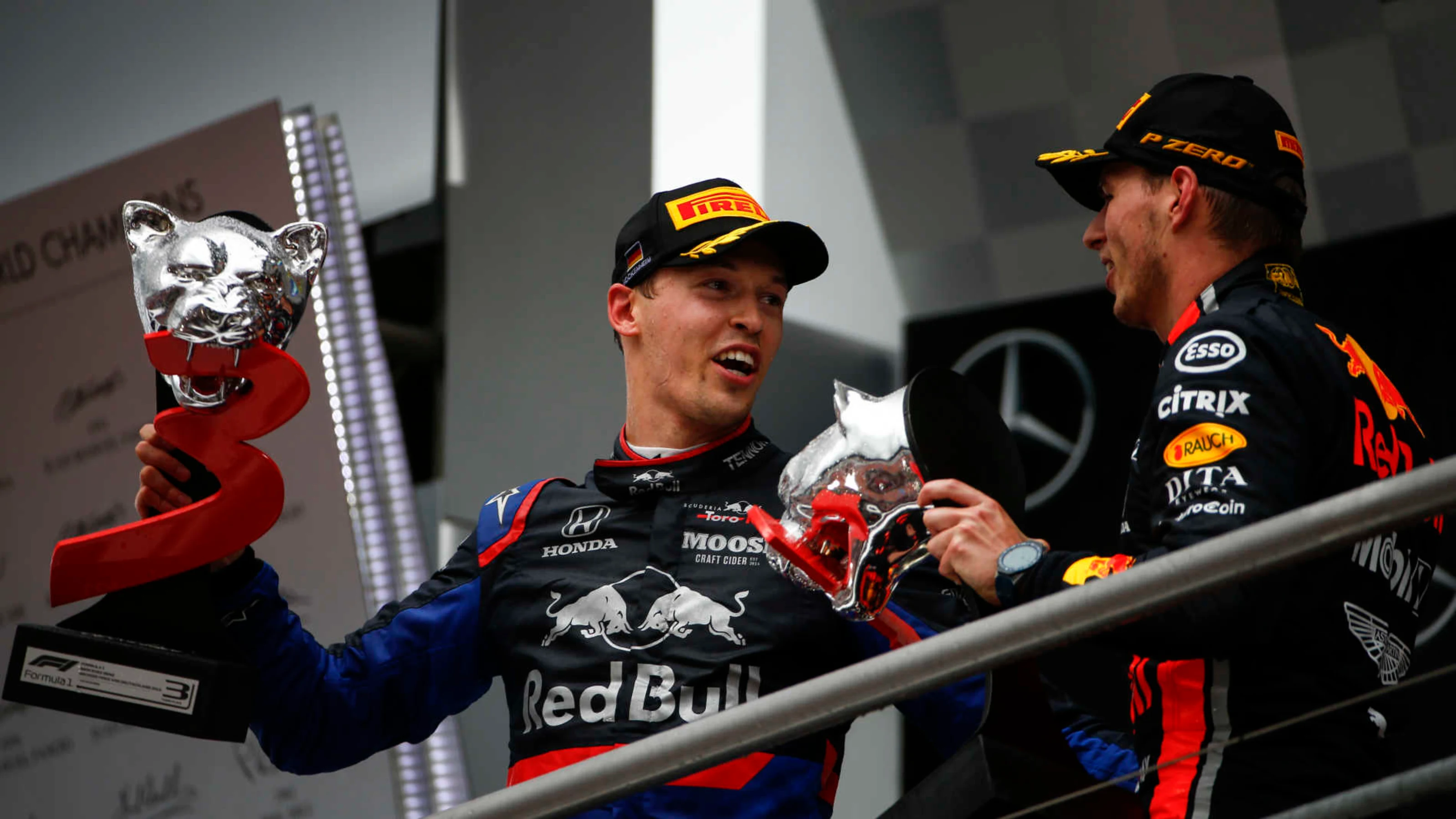 HOCKENHEIMRING, GERMANY - JULY 28: Daniil Kvyat, Toro Rosso, 3rd position, on the podium with Max