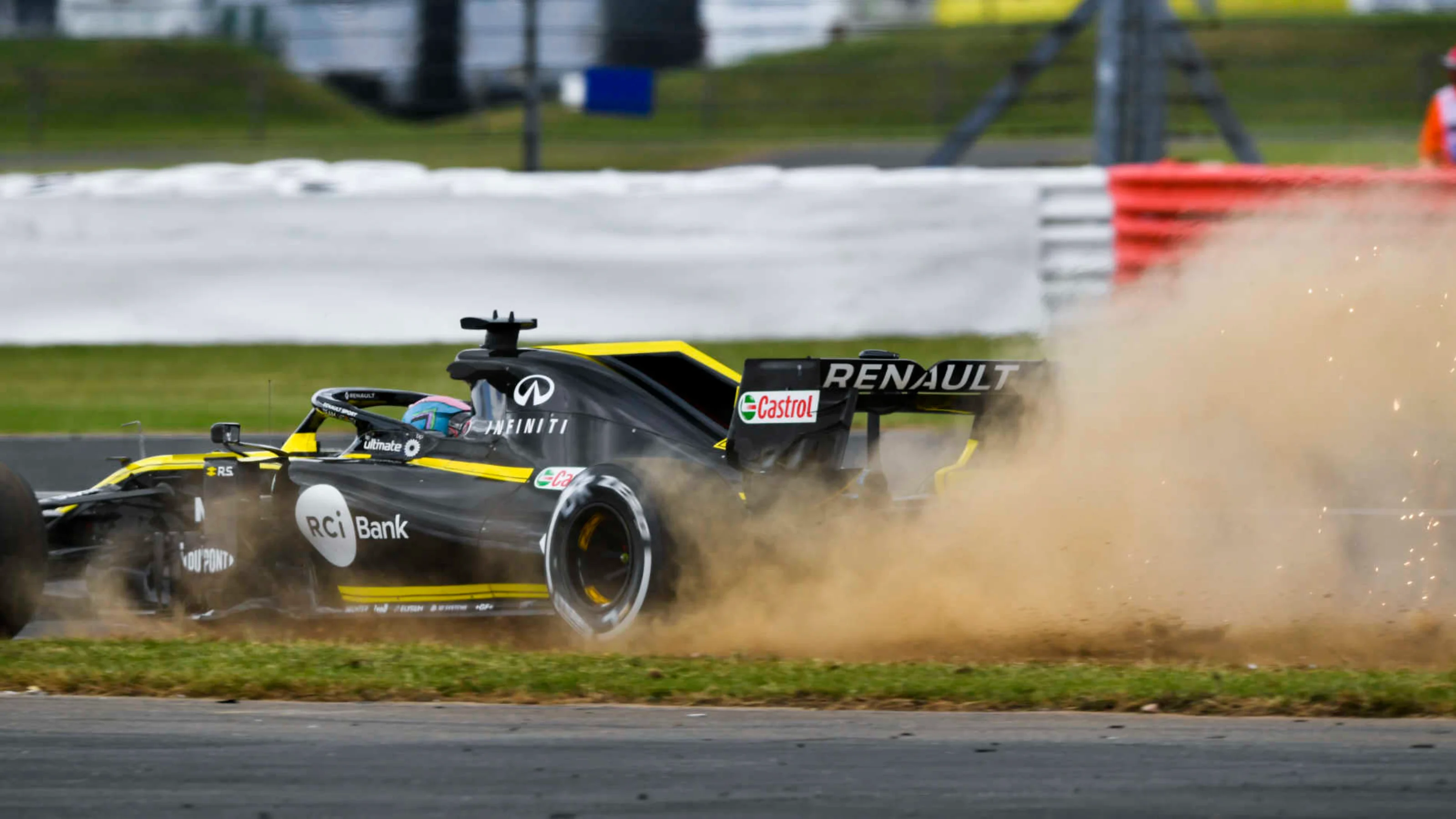 SILVERSTONE, UNITED KINGDOM - JULY 12: Daniel Ricciardo, Renault R.S.19, runs onto the grass during