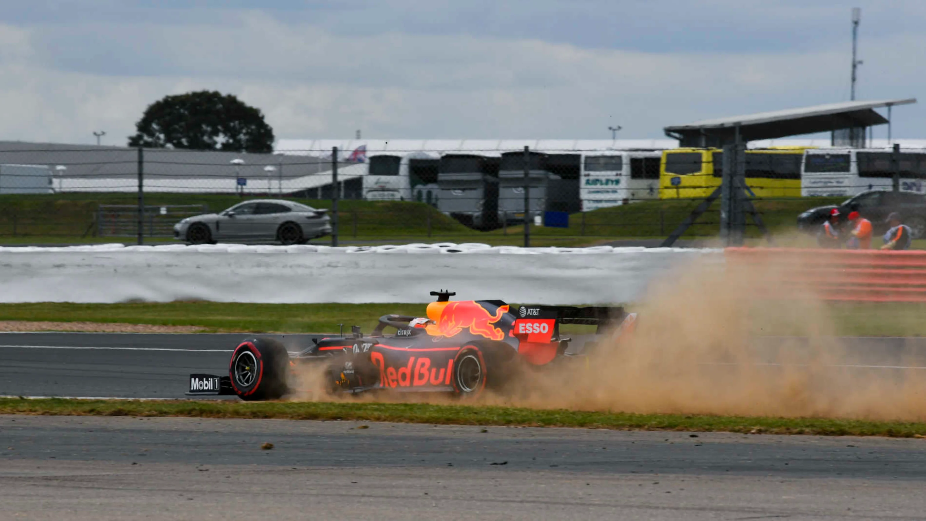 SILVERSTONE, UNITED KINGDOM - JULY 12: Max Verstappen, Red Bull Racing RB15, kicks up dust from the