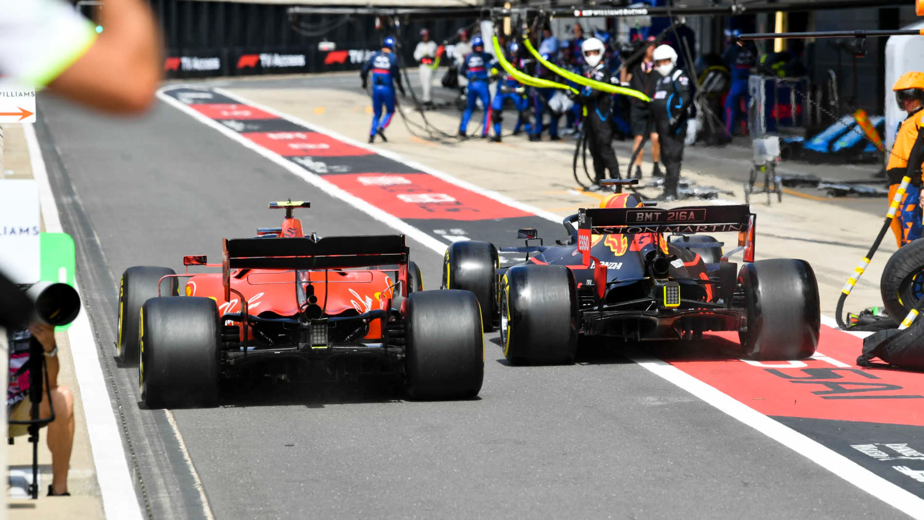 SILVERSTONE, UNITED KINGDOM - JULY 14: Charles Leclerc, Ferrari SF90 and Max Verstappen, Red Bull