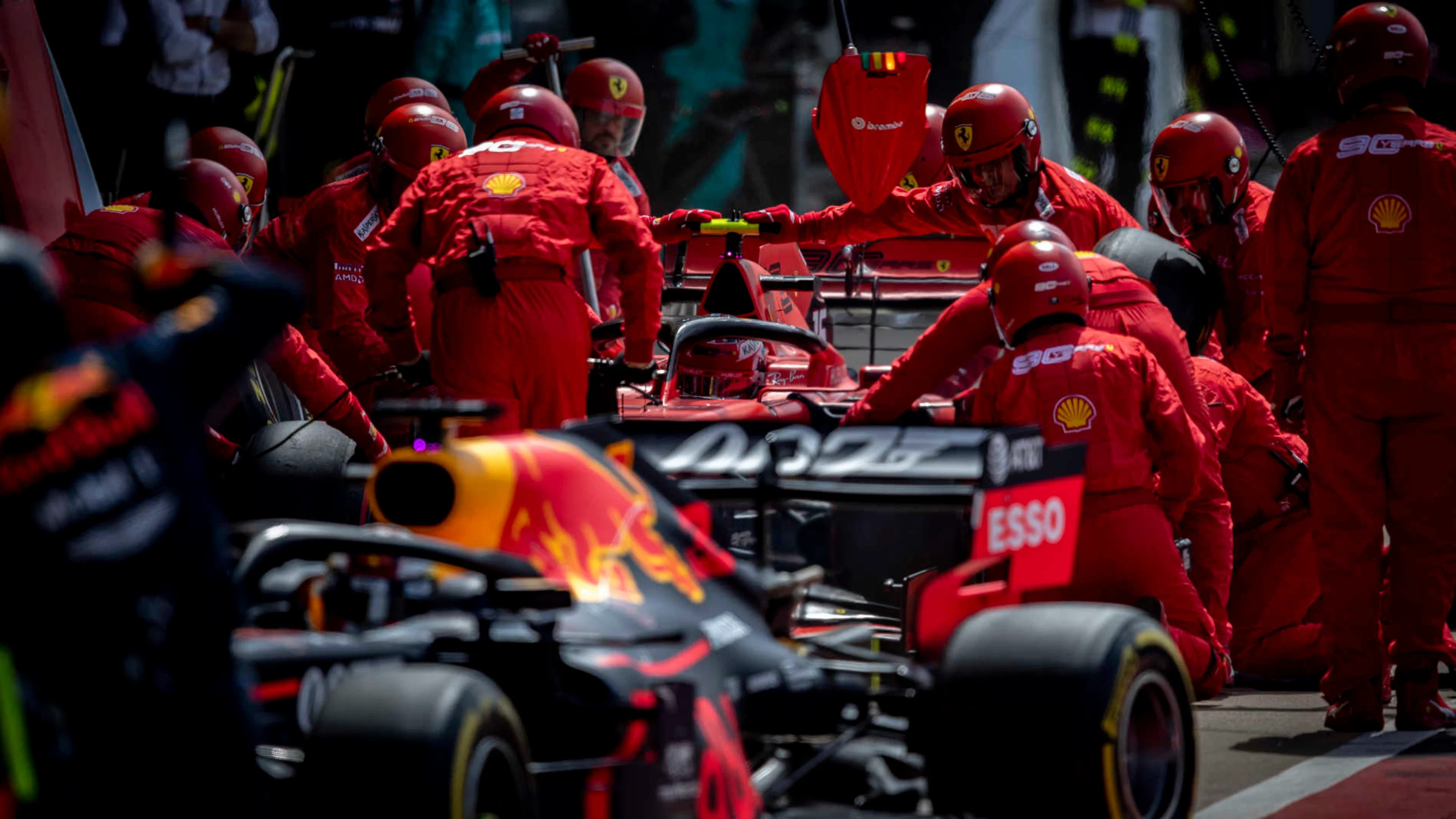 SILVERSTONE, UNITED KINGDOM - JULY 14: Charles Leclerc, Ferrari SF90, pit stops behind Max