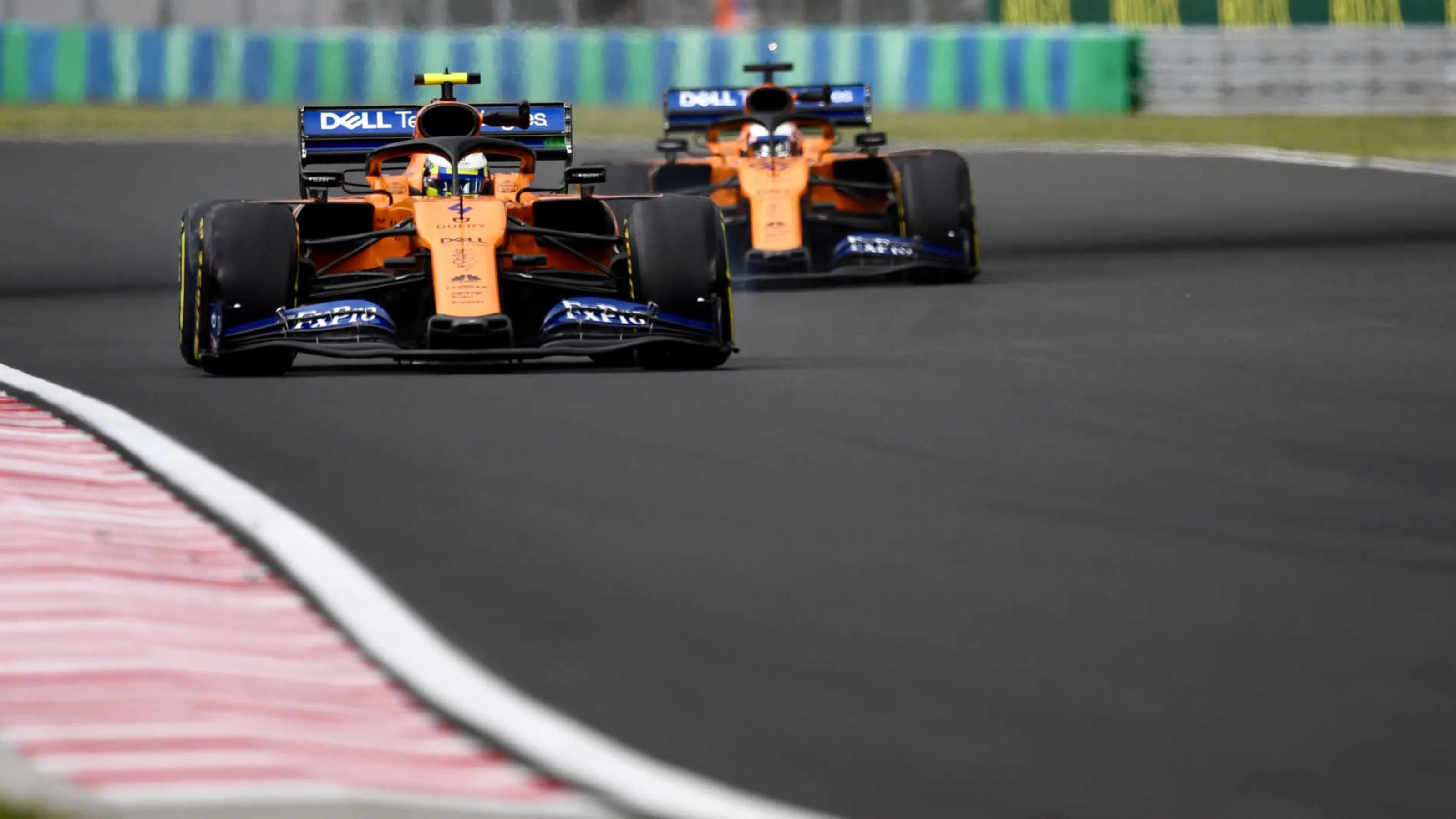 HUNGARORING, HUNGARY - AUGUST 02: Lando Norris, McLaren MCL34, leads Carlos Sainz Jr., McLaren