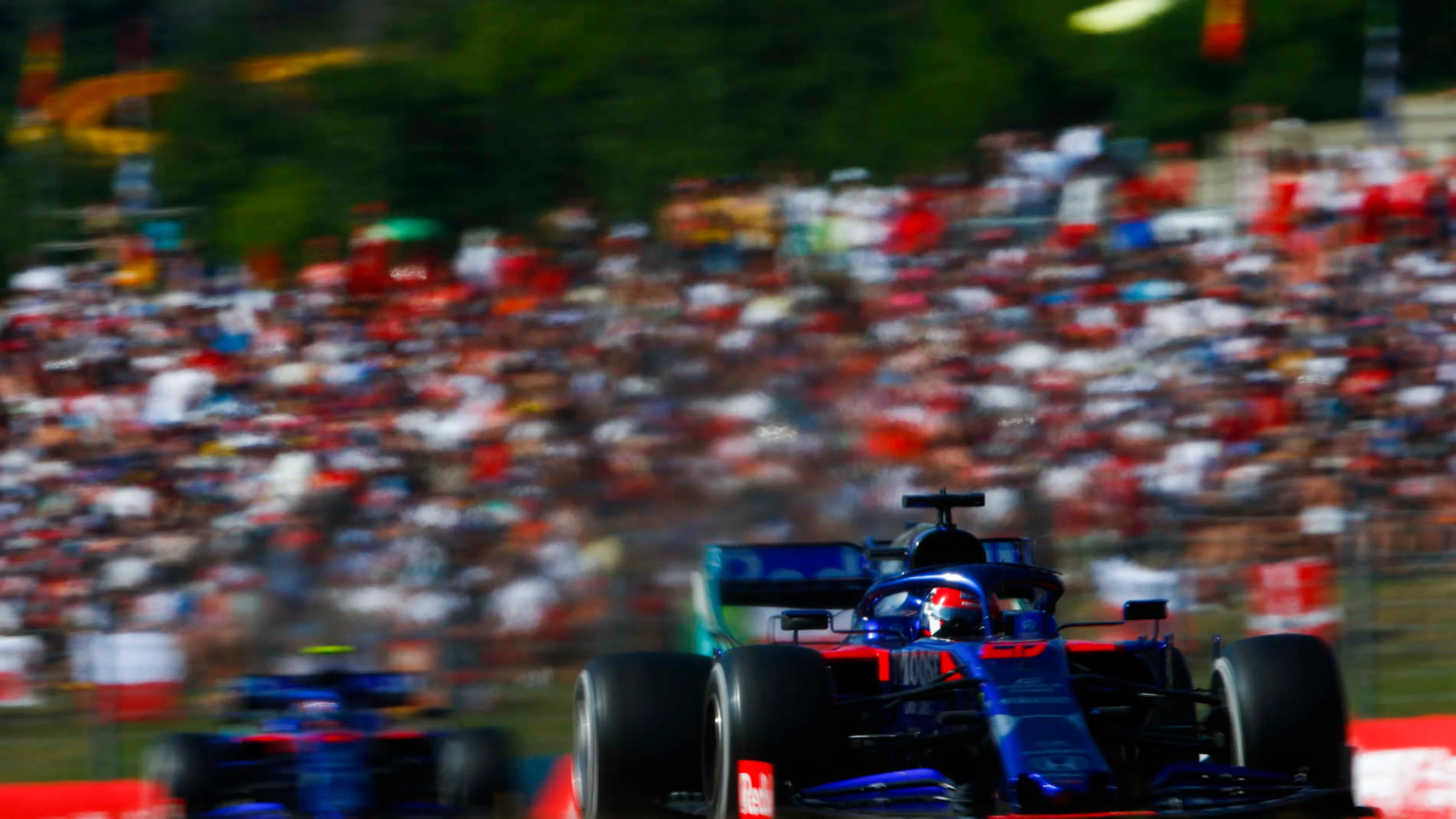 HUNGARORING, HUNGARY - AUGUST 04: Daniil Kvyat, Toro Rosso STR14 leads Alexander Albon, Toro Rosso