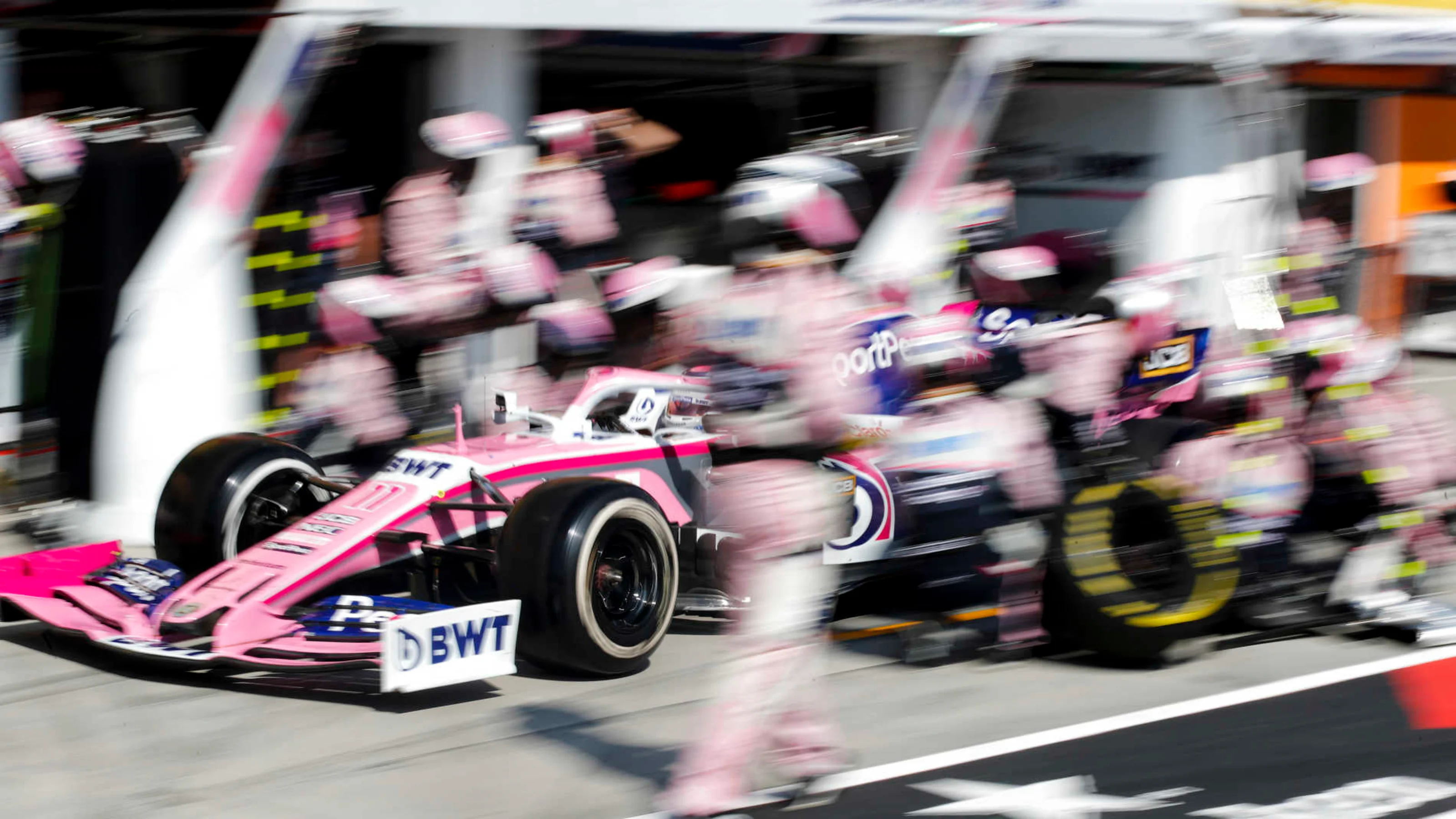 HUNGARORING, HUNGARY - AUGUST 04: Sergio Perez, Racing Point RP19, makes a stop during the