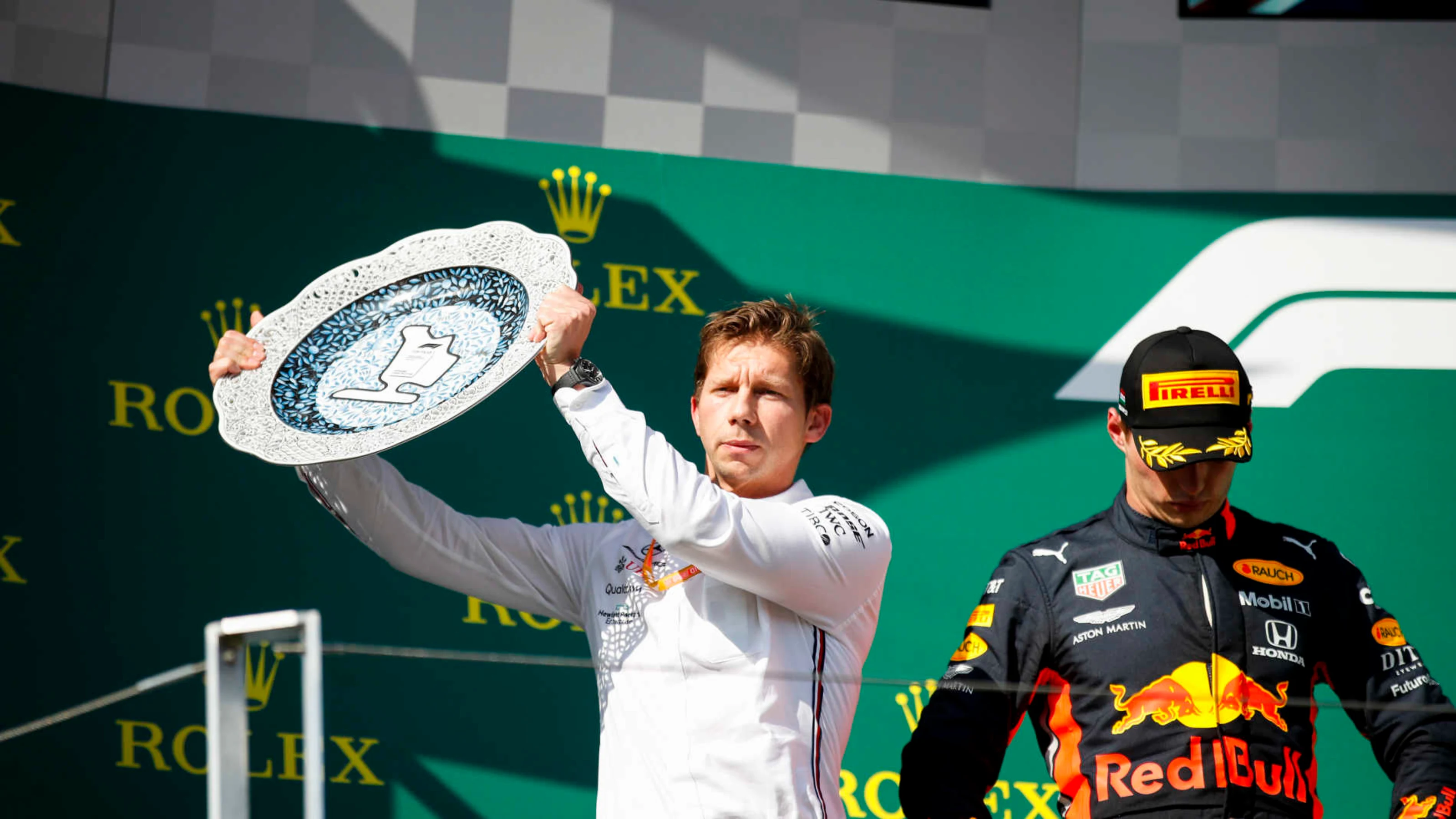 HUNGARORING, HUNGARY - AUGUST 04: Matt Deane, Chief Mechanic, Mercedes AMG, receives the