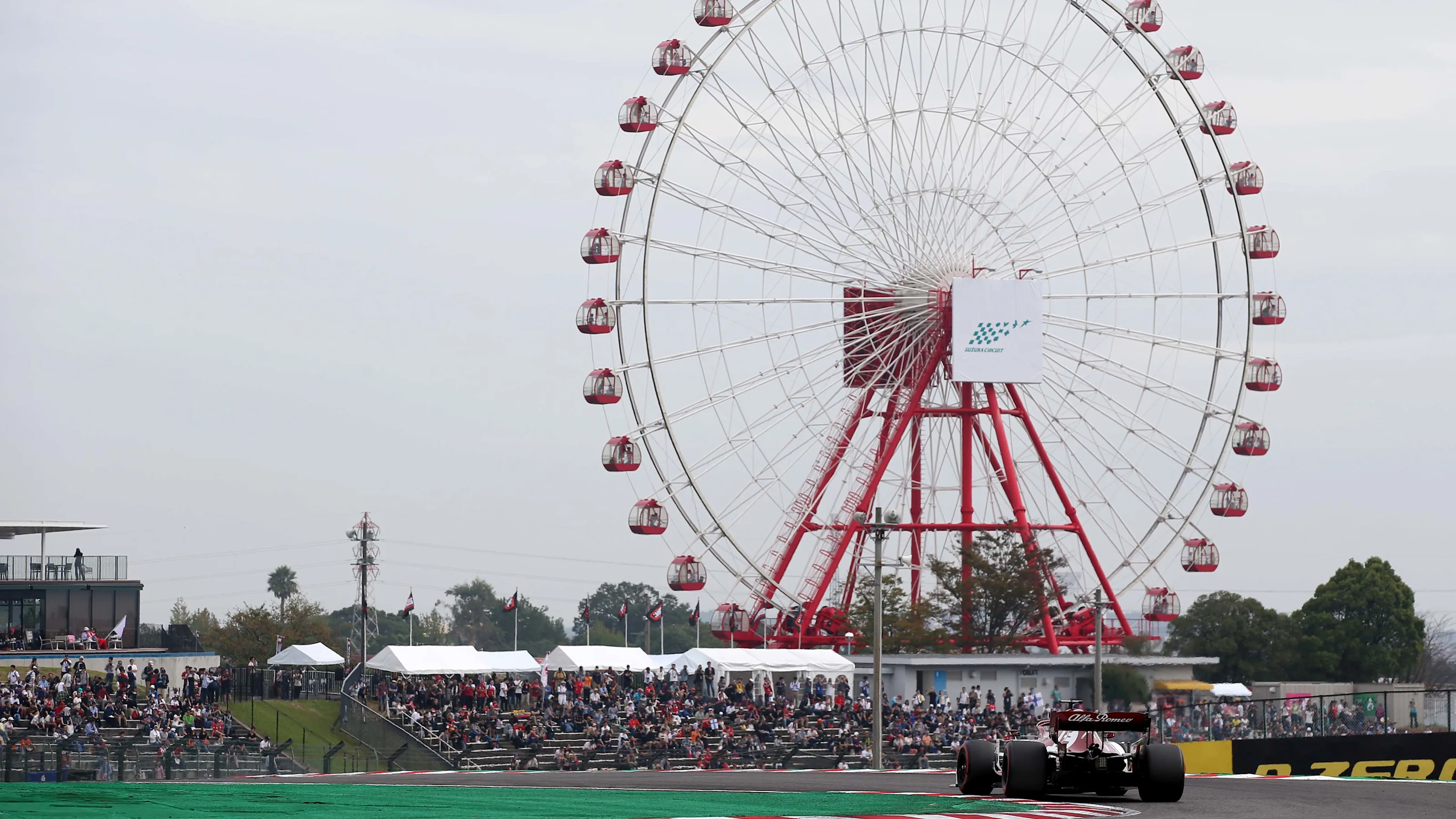 SUZUKA, JAPAN - OCTOBER 11: Kimi Raikkonen of Finland driving the (7) Alfa Romeo Racing C38 Ferrari
