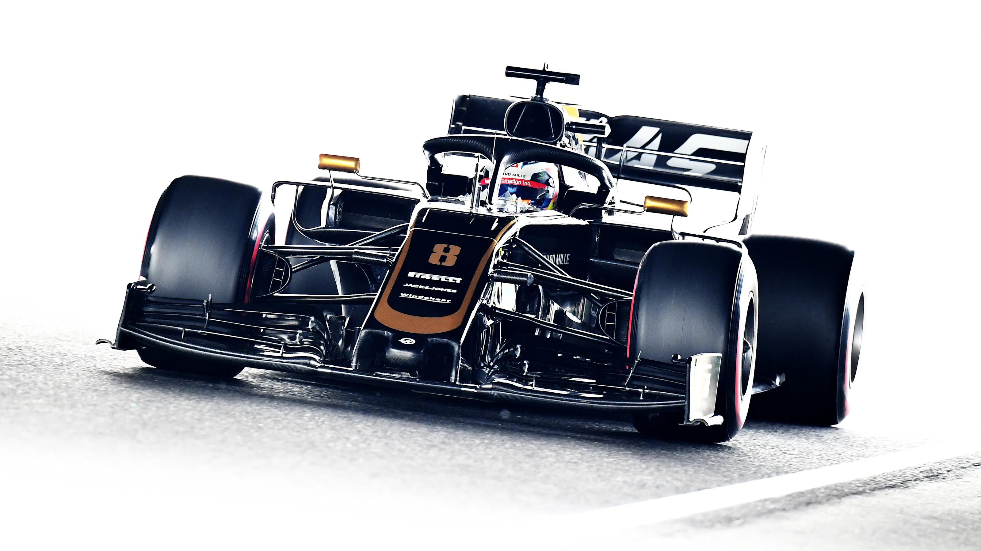 SUZUKA, JAPAN - OCTOBER 11: Romain Grosjean of France driving the (8) Haas F1 Team VF-19 Ferrari on