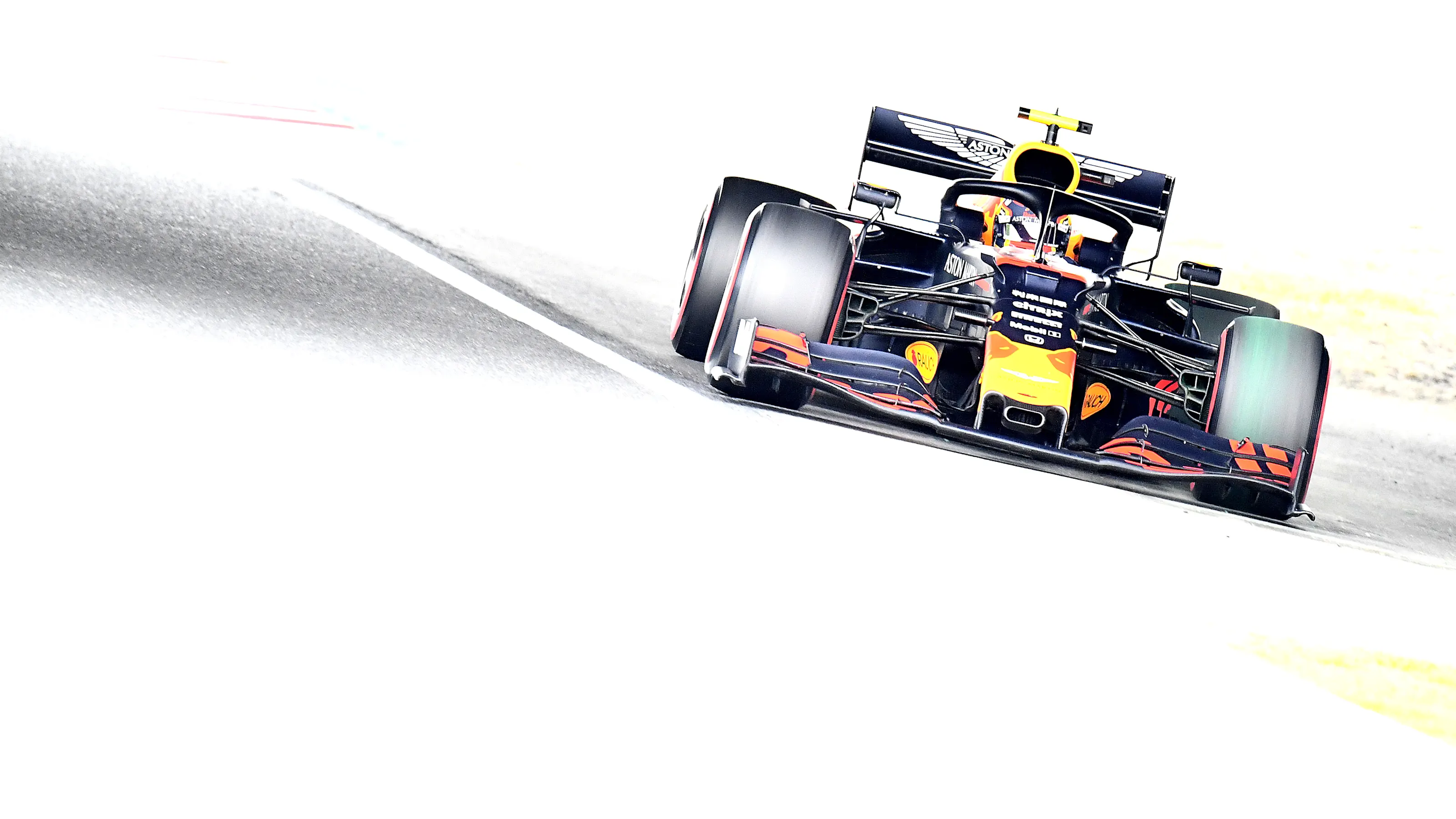 SUZUKA, JAPAN - OCTOBER 11: Alexander Albon of Thailand driving the (23) Aston Martin Red Bull