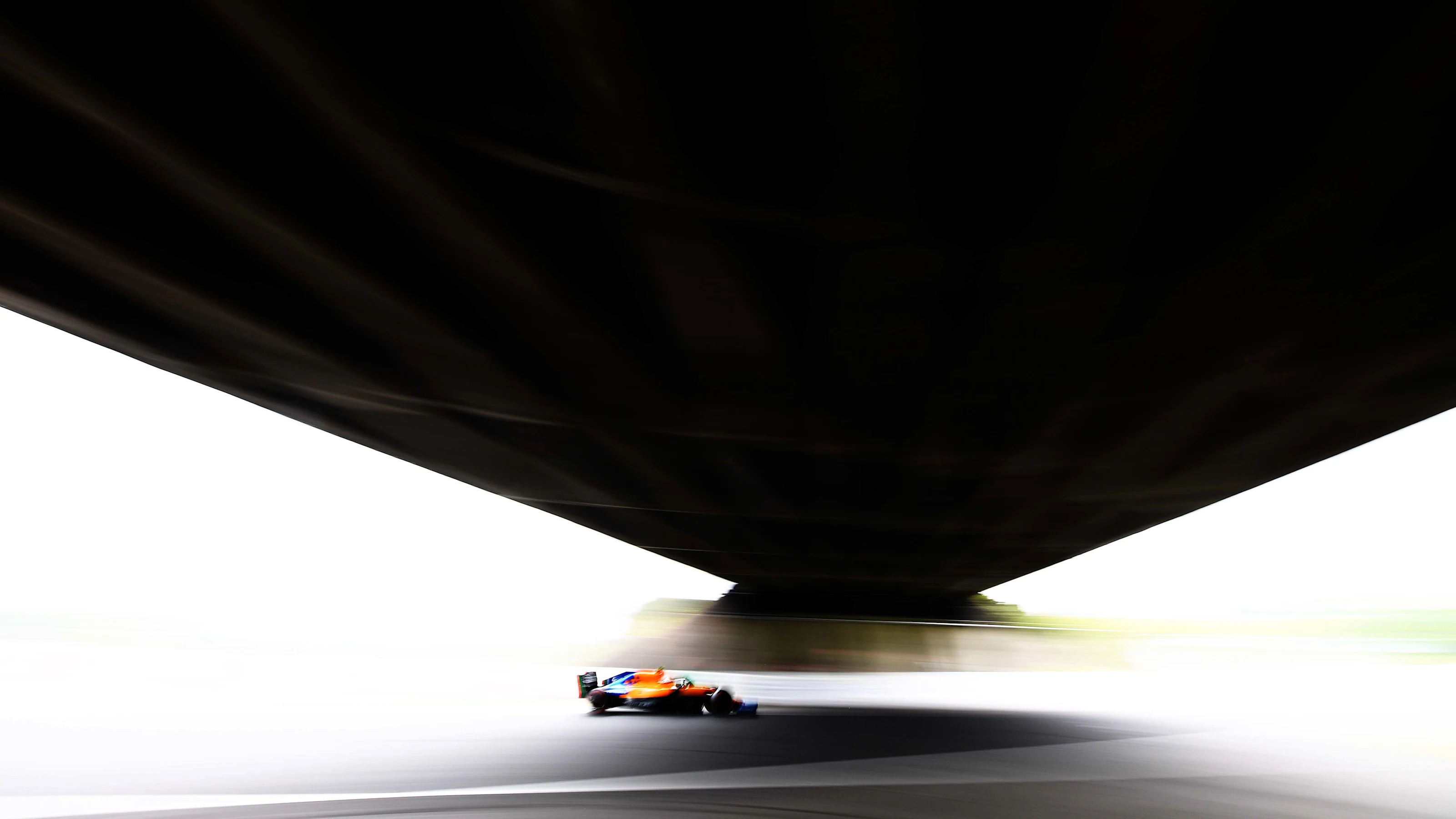 SUZUKA, JAPAN - OCTOBER 11: Lando Norris of Great Britain driving the (4) McLaren F1 Team MCL34
