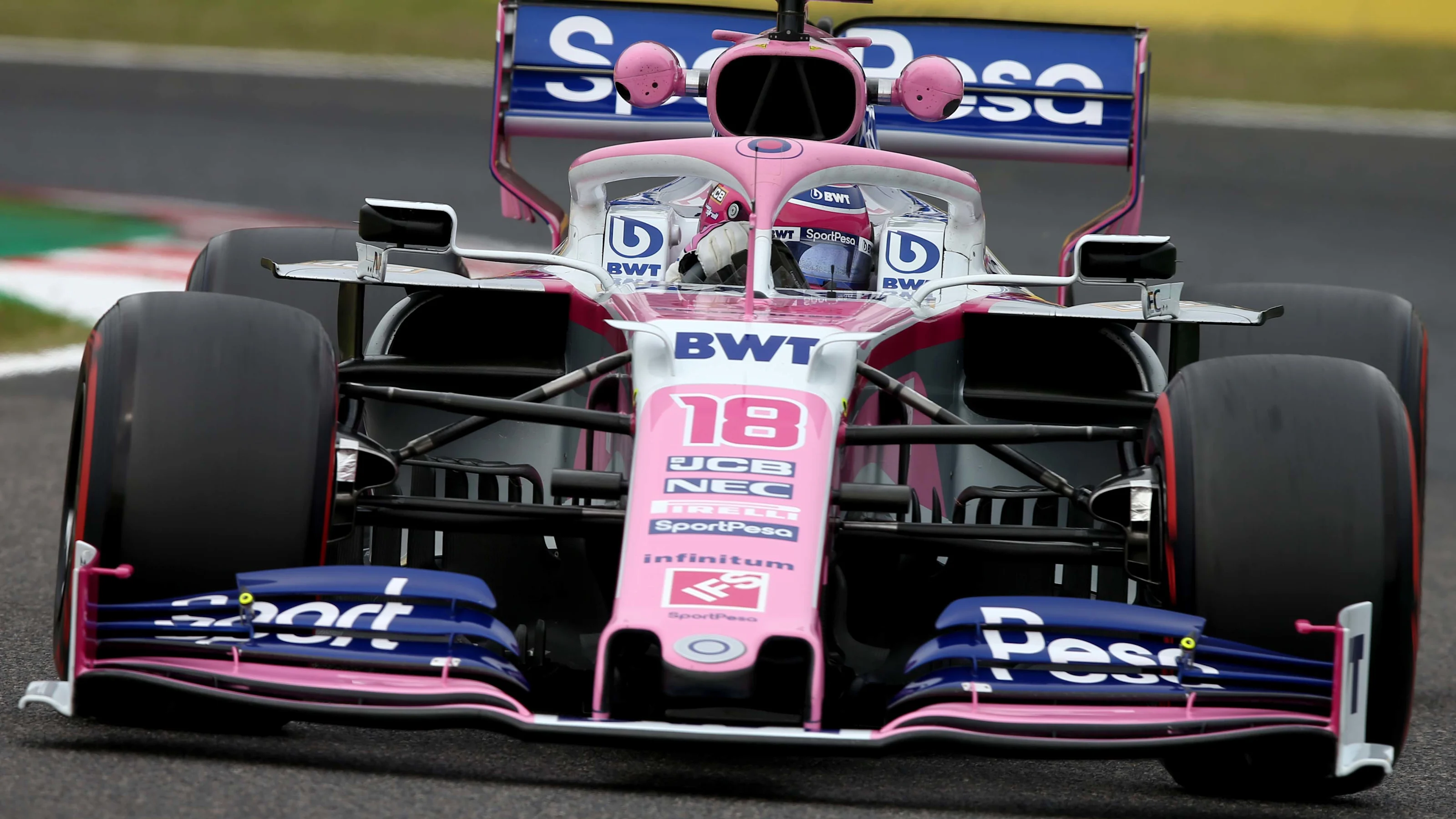 SUZUKA, JAPAN - OCTOBER 11: Lance Stroll of Canada driving the (18) Racing Point RP19 Mercedes on