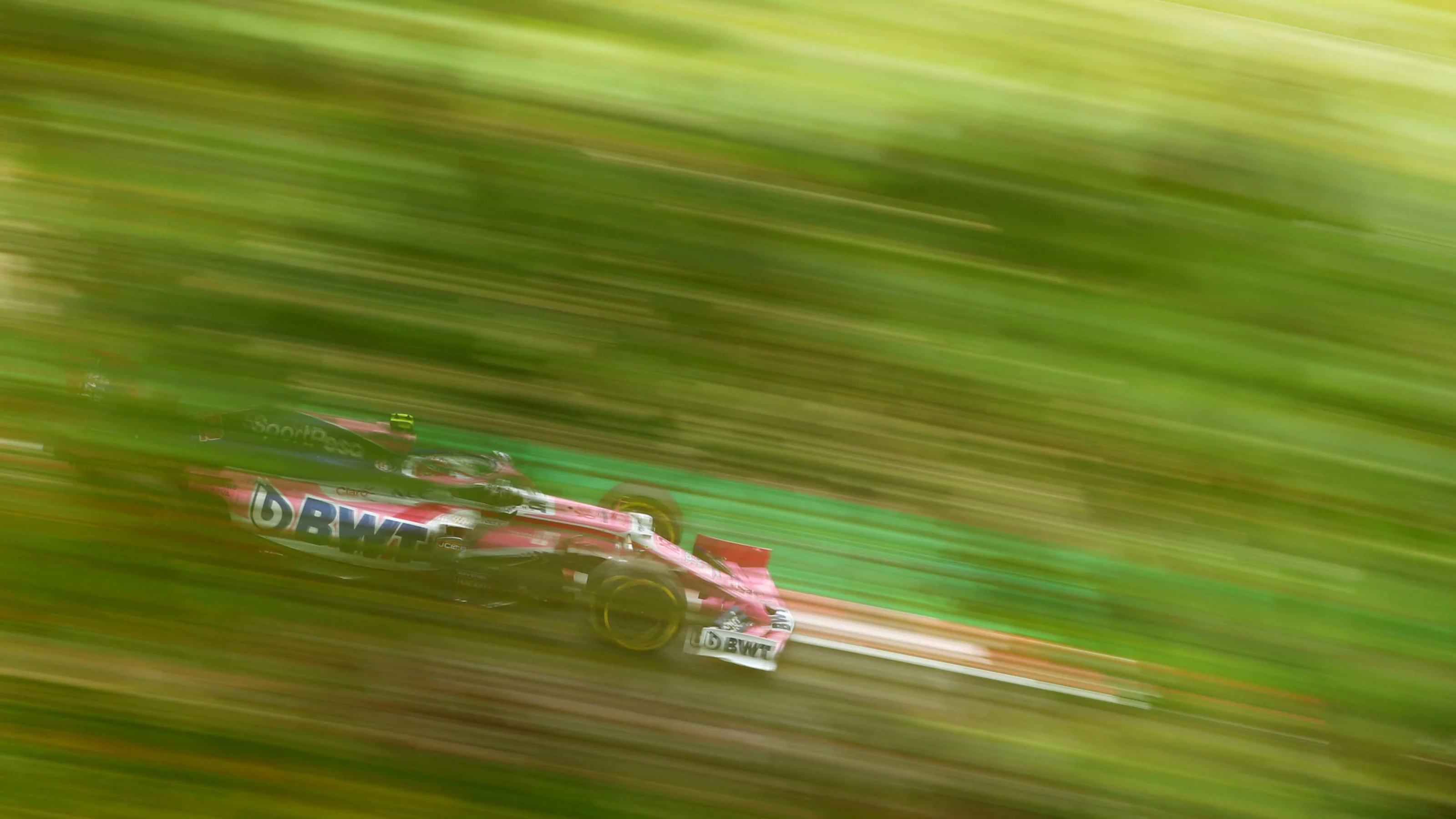 SUZUKA, JAPAN - OCTOBER 11: Lance Stroll of Canada driving the (18) Racing Point RP19 Mercedes on