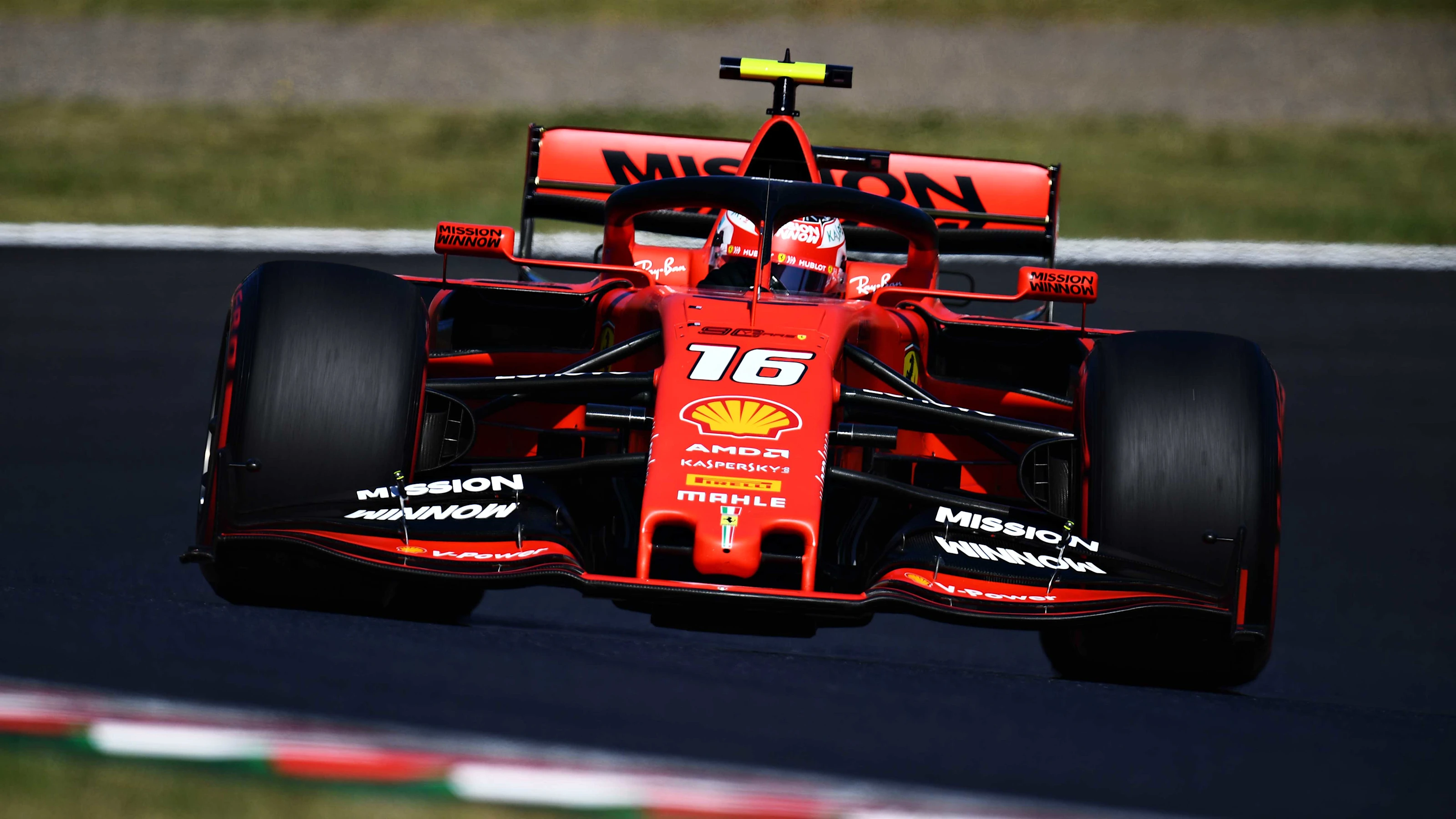 SUZUKA, JAPAN - OCTOBER 13: Charles Leclerc of Monaco driving the (16) Scuderia Ferrari SF90 on the