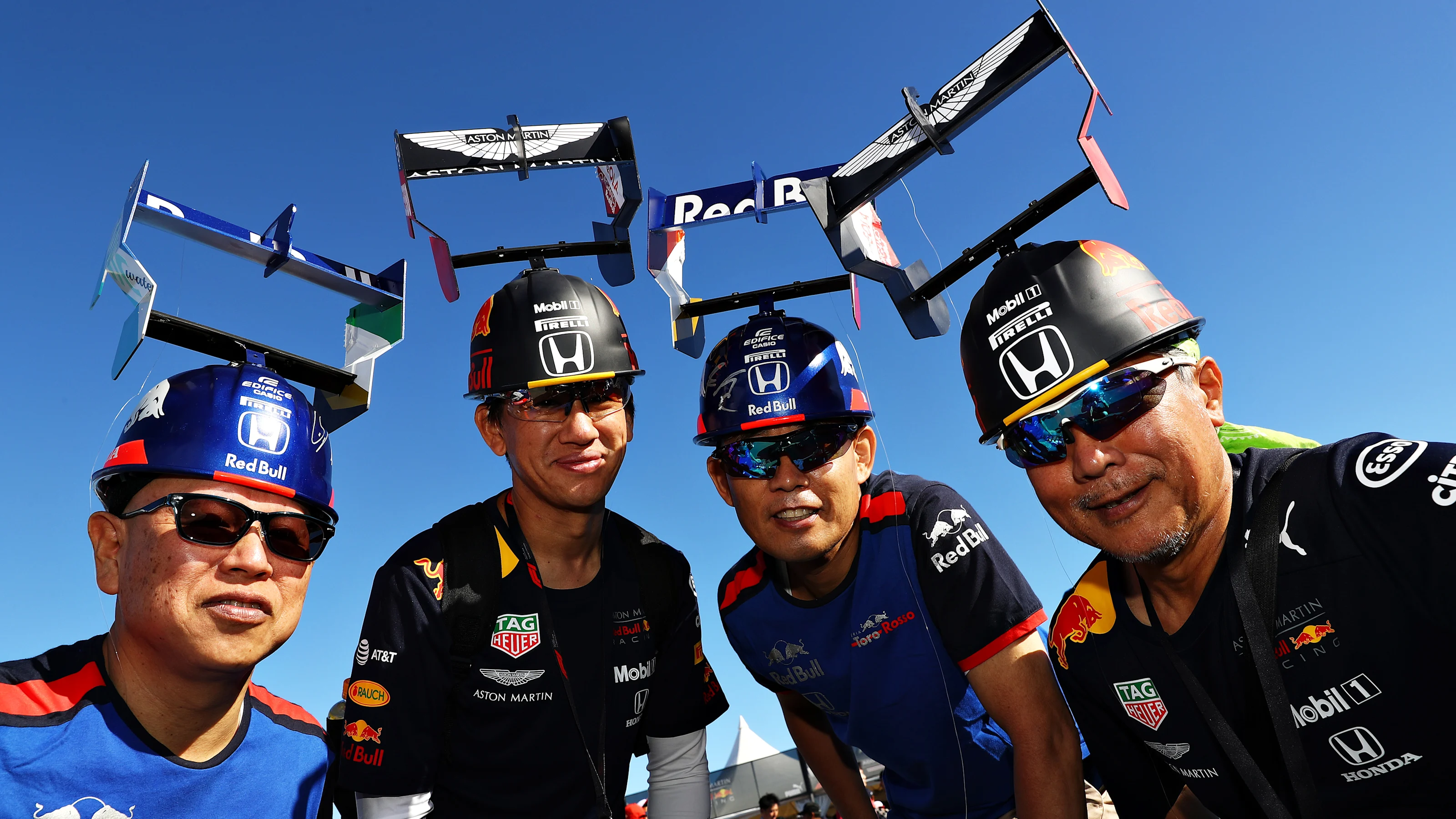 SUZUKA, JAPAN - OCTOBER 13: Red Bull Racing and Scuderia Toro Rosso fans show their support before