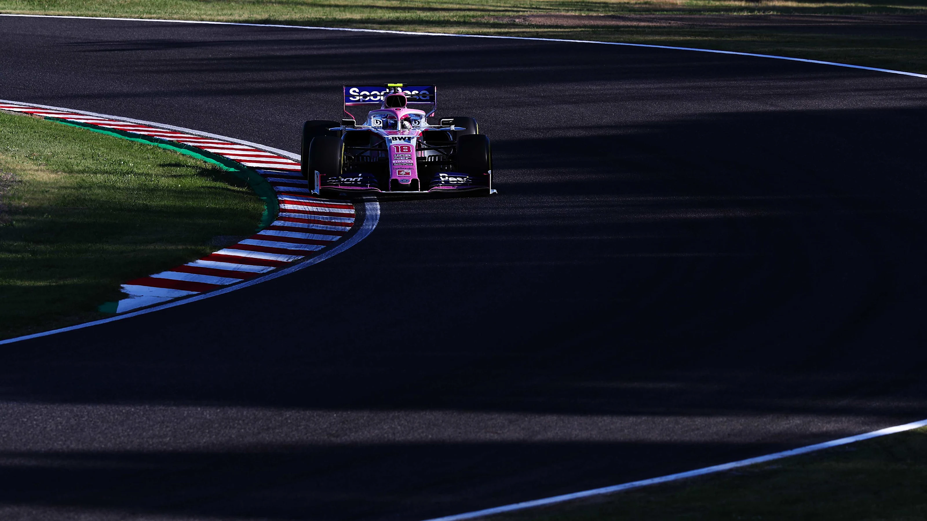 SUZUKA, JAPAN - OCTOBER 13: Lance Stroll of Canada driving the (18) Racing Point RP19 Mercedes on
