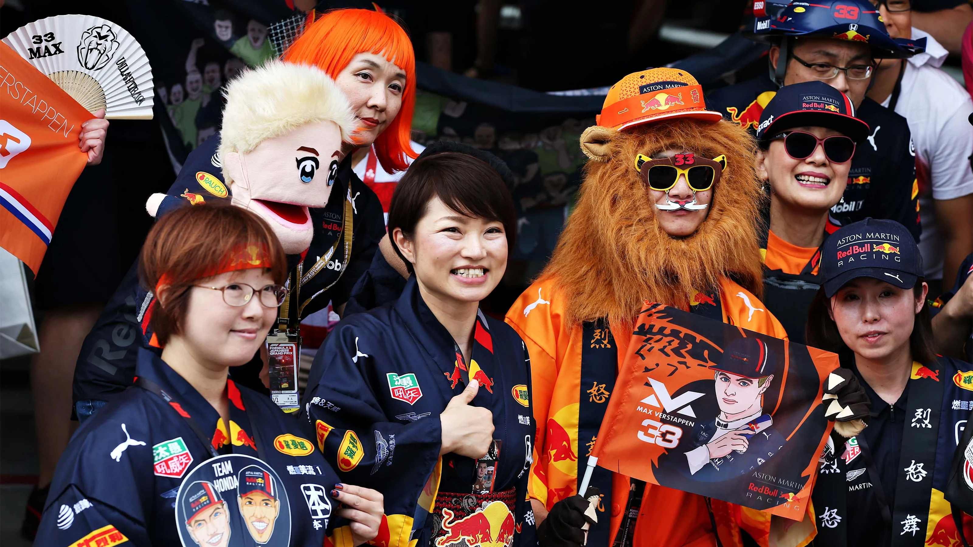 SUZUKA, JAPAN - OCTOBER 10: Red Bull Racing fans show their support during previews ahead of the F1