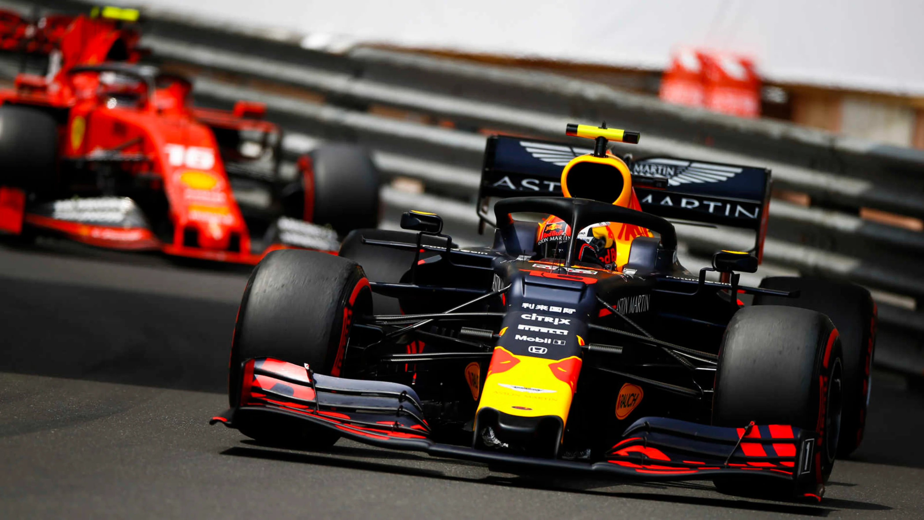 MONTE CARLO, MONACO - MAY 25: Pierre Gasly, Red Bull Racing RB15, leads Charles Leclerc, Ferrari