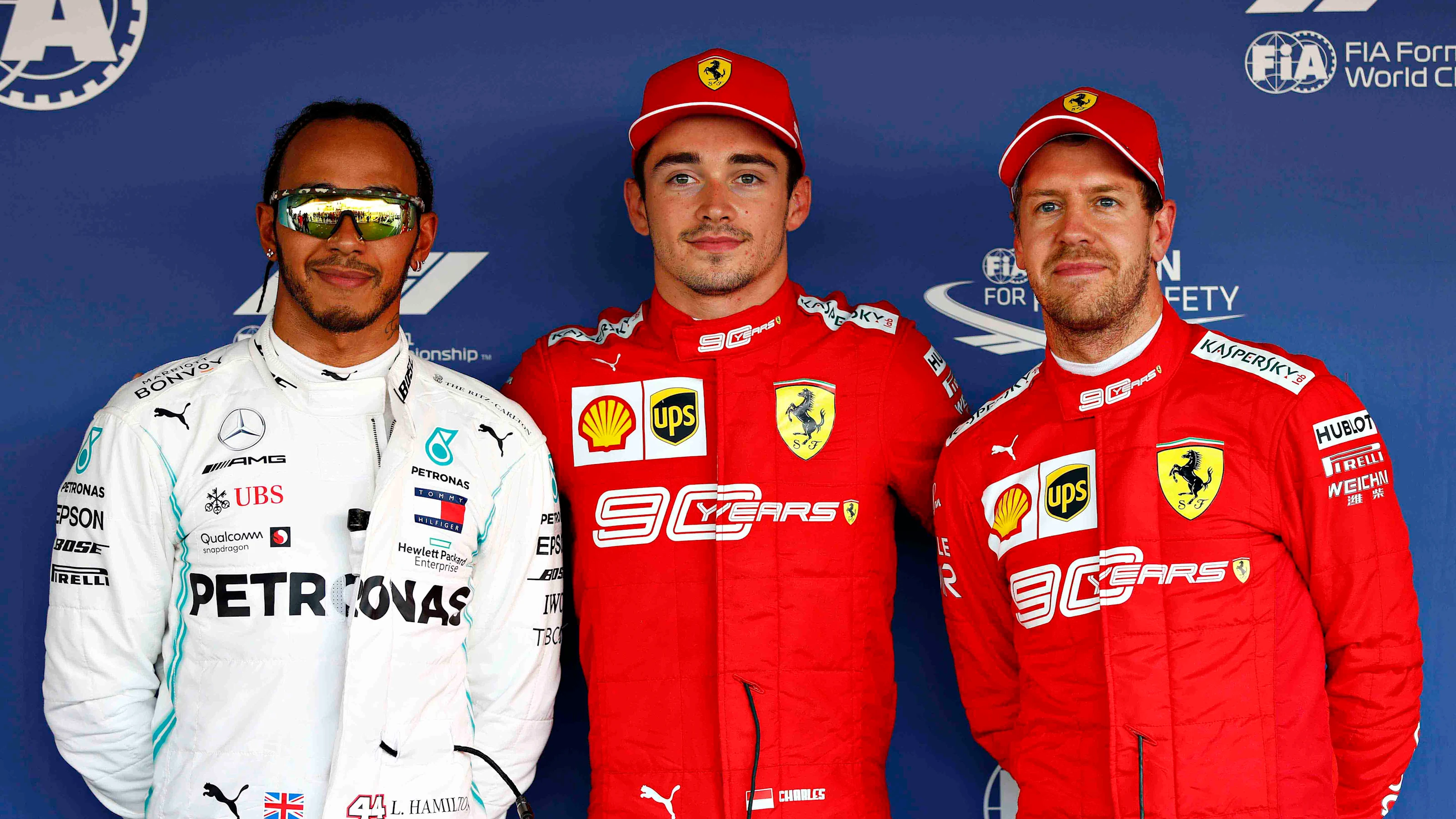 SOCHI, RUSSIA - SEPTEMBER 28: Top three qualifiers Charles Leclerc of Monaco and Ferrari,Lewis