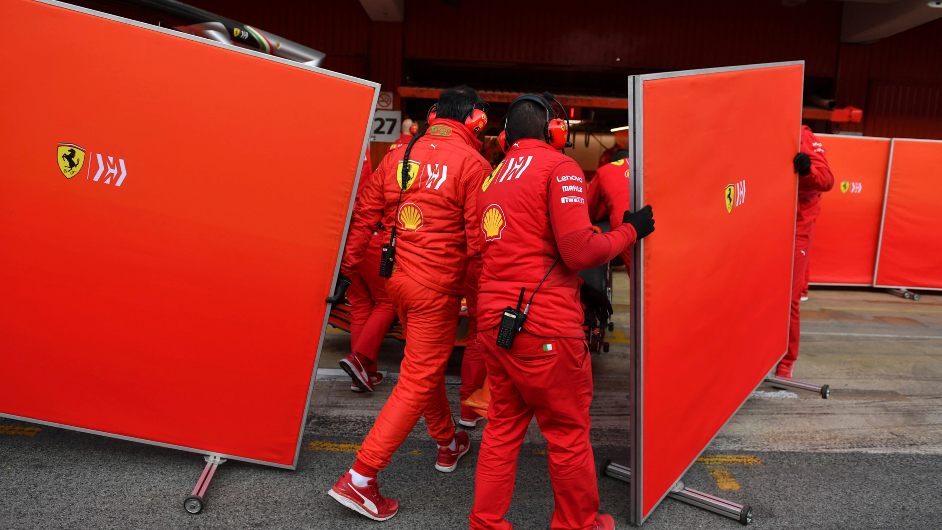 CIRCUIT DE BARCELONA-CATALUNYA, SPAIN - FEBRUARY 21: Ferrari mechanics with garage screens during