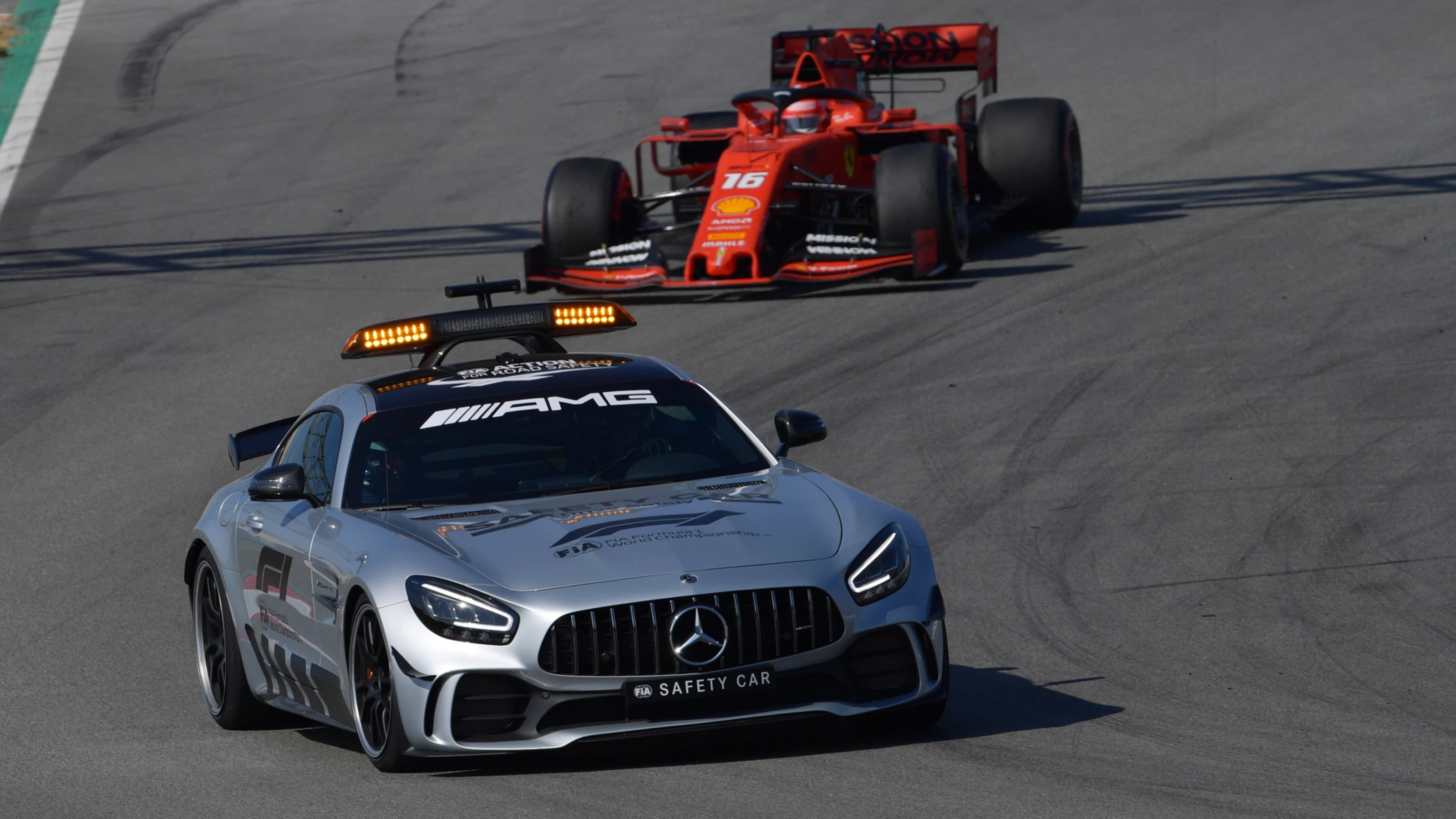CIRCUIT DE BARCELONA-CATALUNYA, SPAIN - FEBRUARY 28: Safety Car leads Charles Leclerc, Ferrari SF90