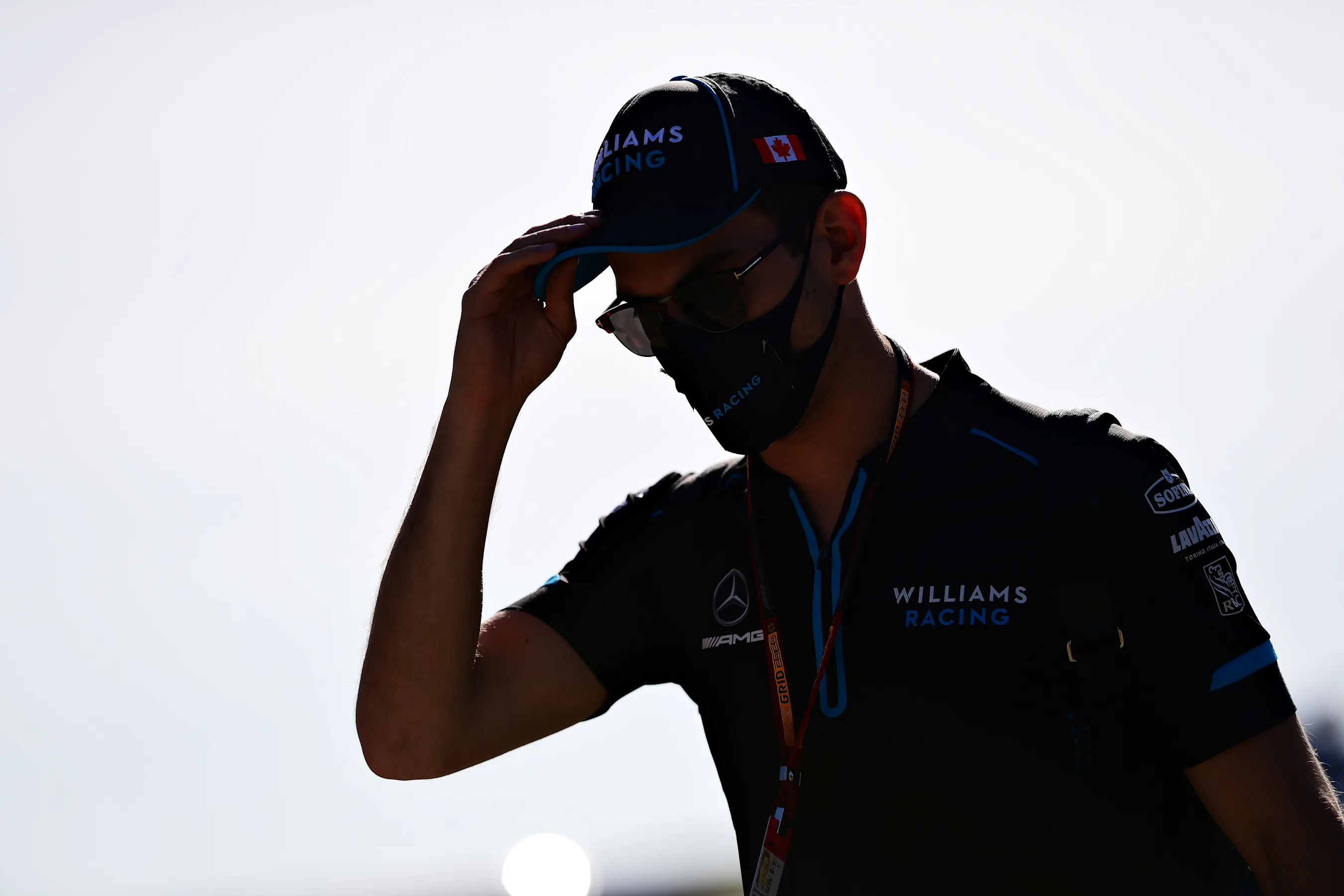 NORTHAMPTON, ENGLAND - AUGUST 07: Nicholas Latifi of Canada and Williams walks in the Paddock
