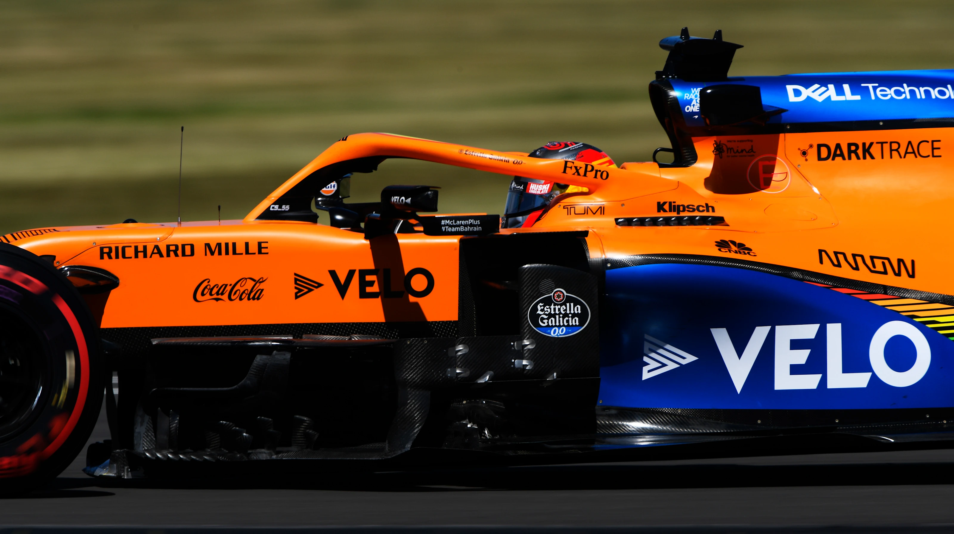NORTHAMPTON, ENGLAND - AUGUST 07: Carlos Sainz of Spain driving the (55) McLaren F1 Team MCL35
